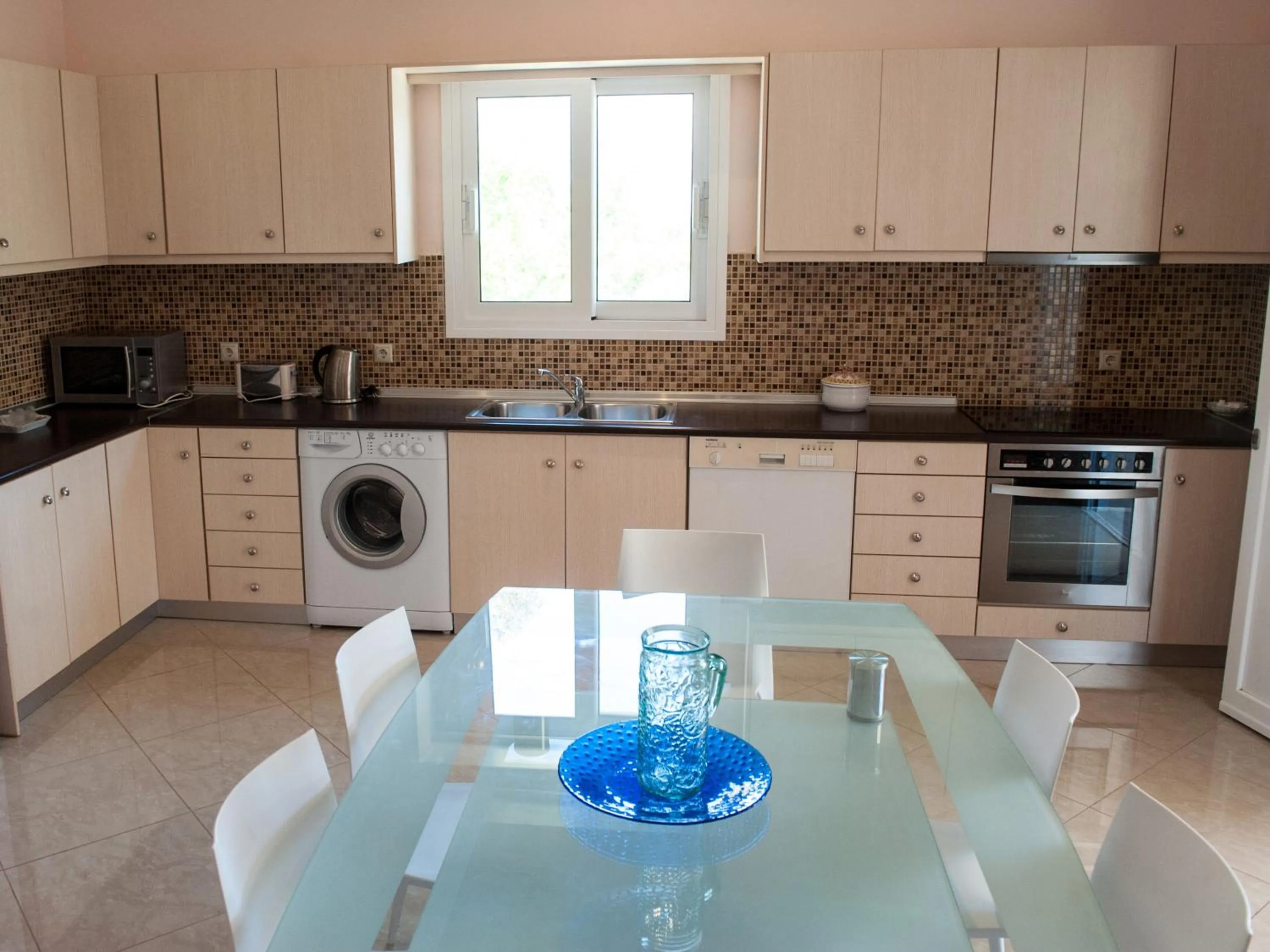 Kitchen or kitchenette in Residence Poseidon