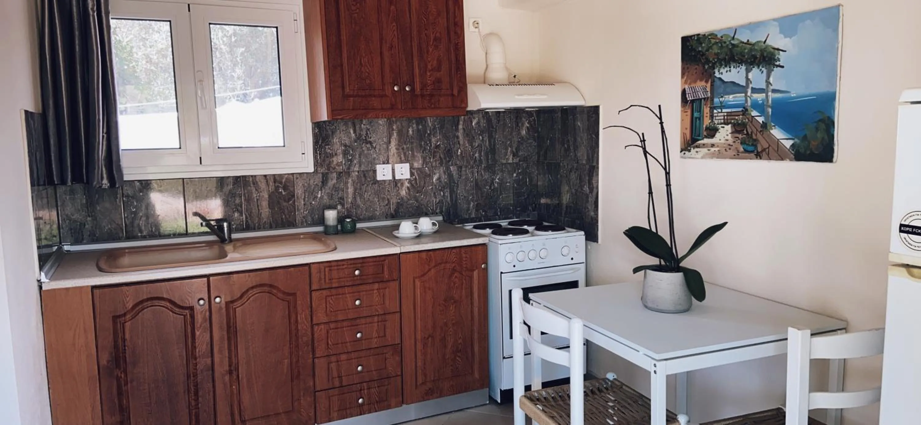 Kitchen or kitchenette in Residence Poseidon