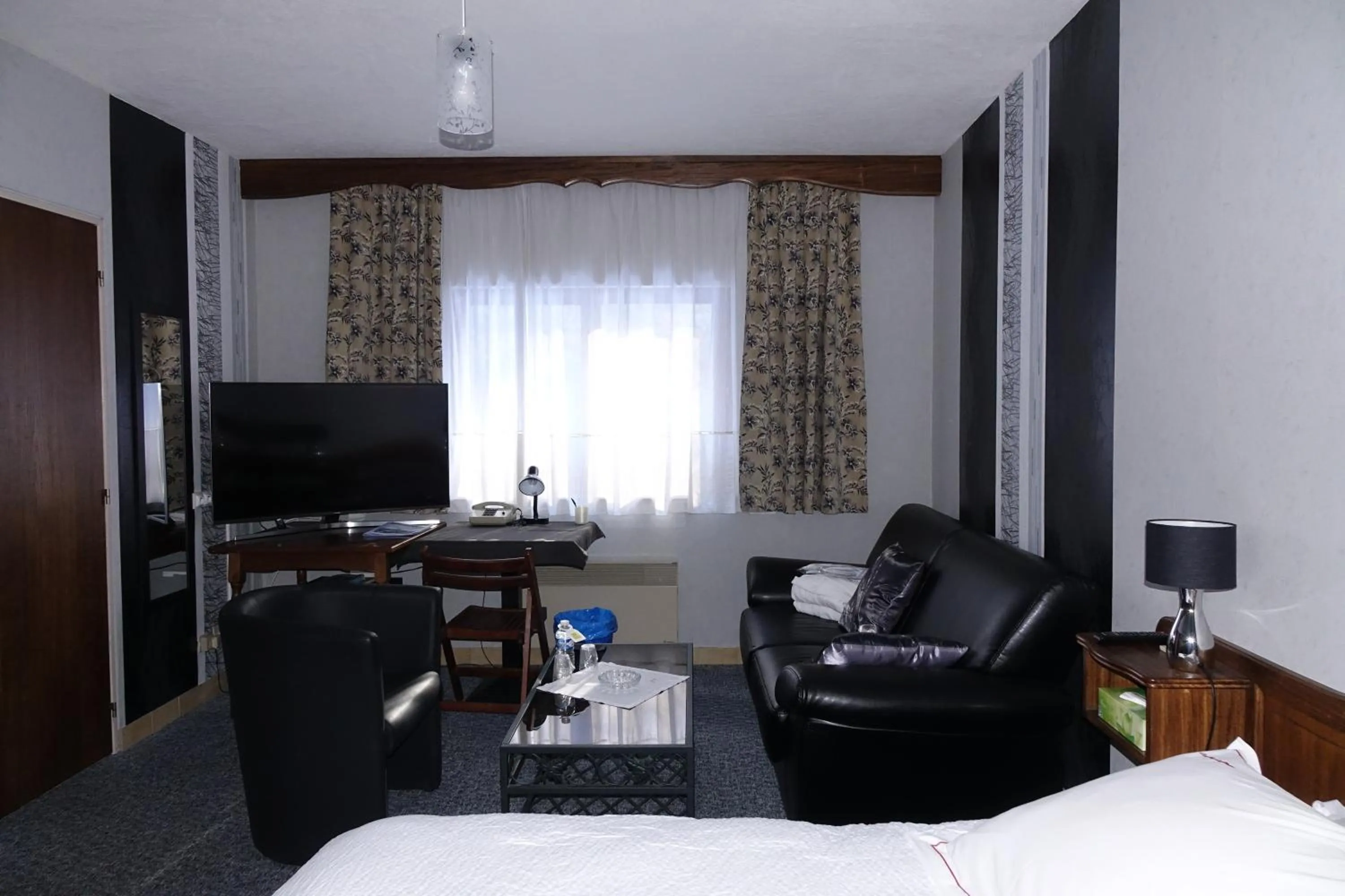 Bedroom in Hotel-Spa & Restaurant Logis Domaine Langmatt