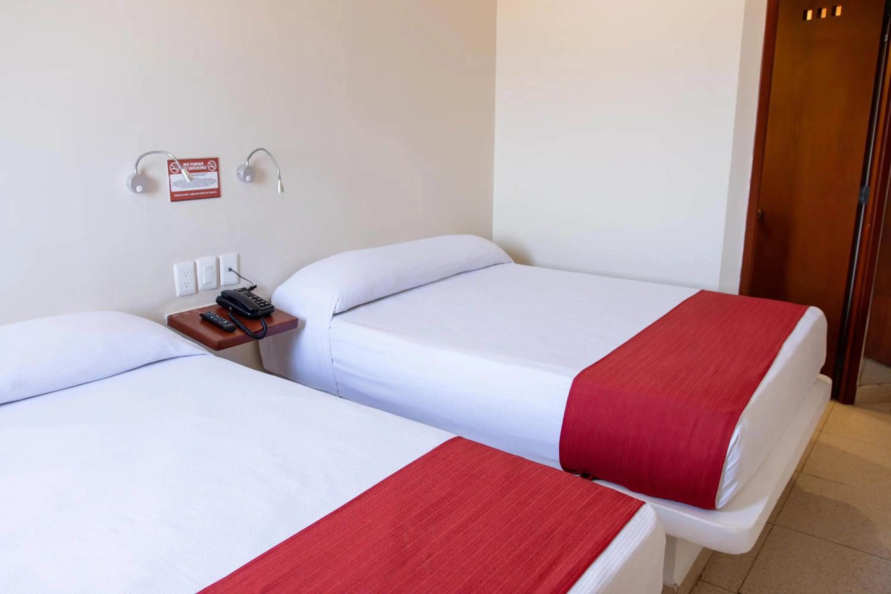 Bed in Mishol Bodas Hotel & Beach Club Acapulco Diamante