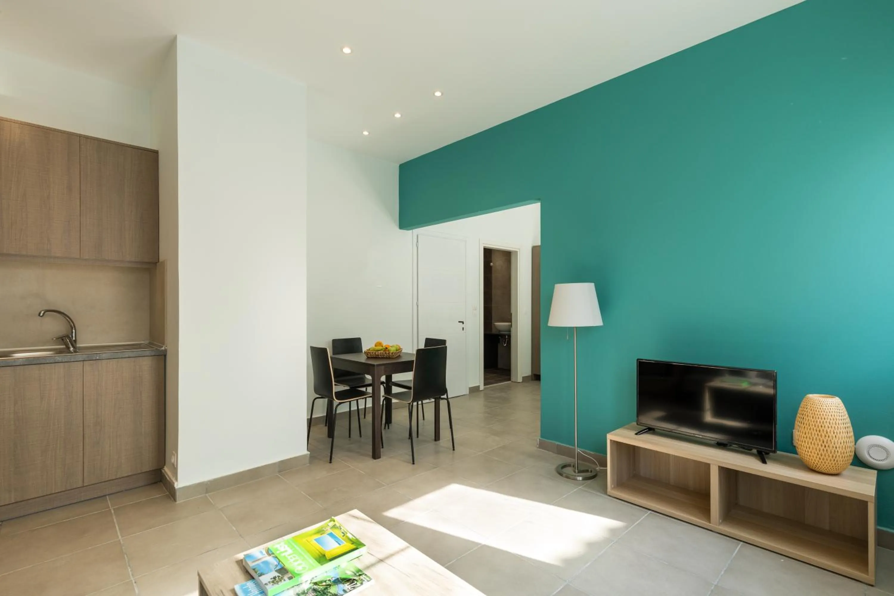 Kitchen or kitchenette in Local Hostel & Suites