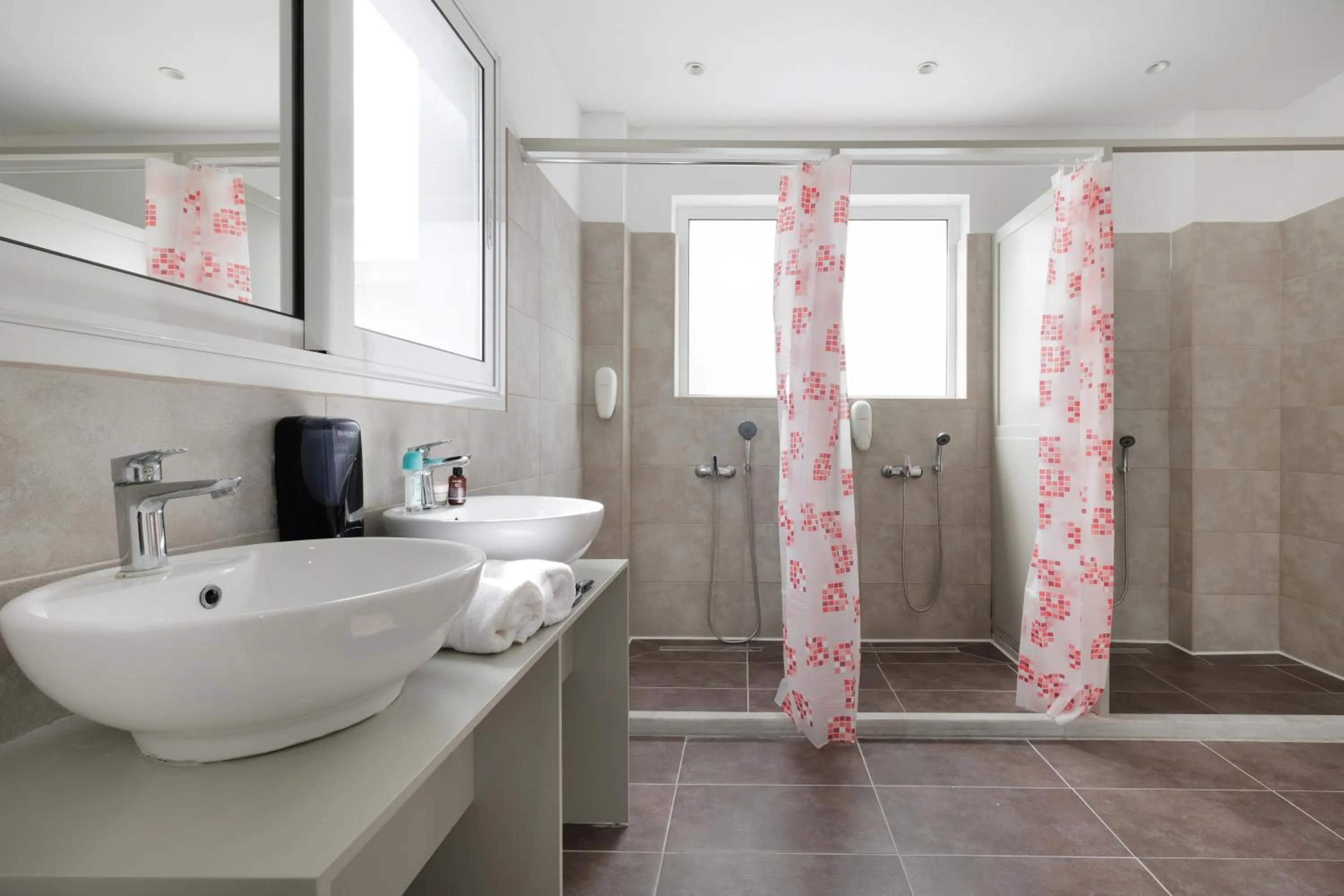 Shower in Local Hostel & Suites