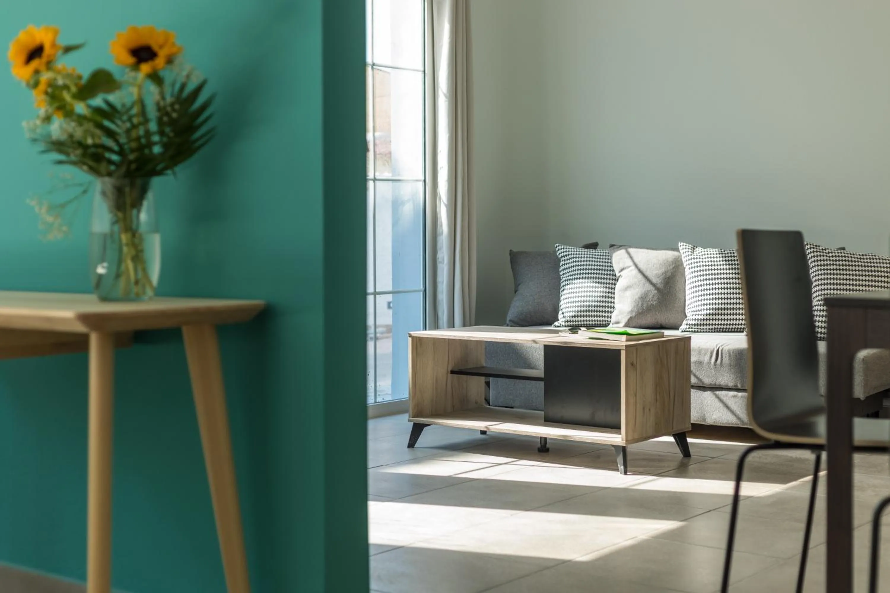 Living room in Local Hostel & Suites