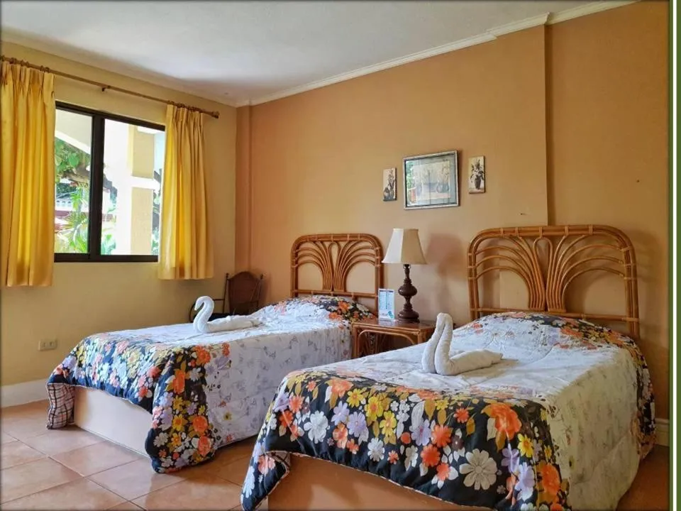 Bed in Playa Papagayo Beach Inn