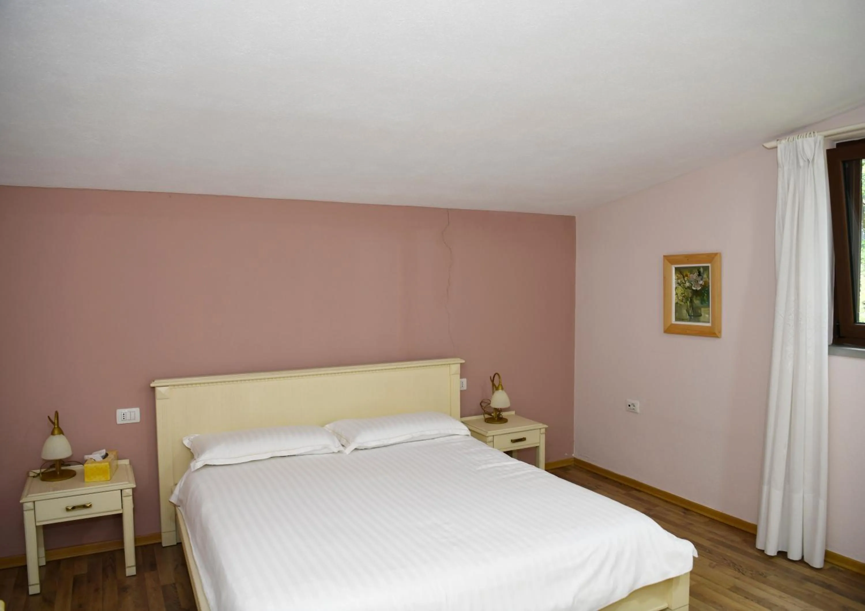 Bed in Hotel Restaurant Dreri