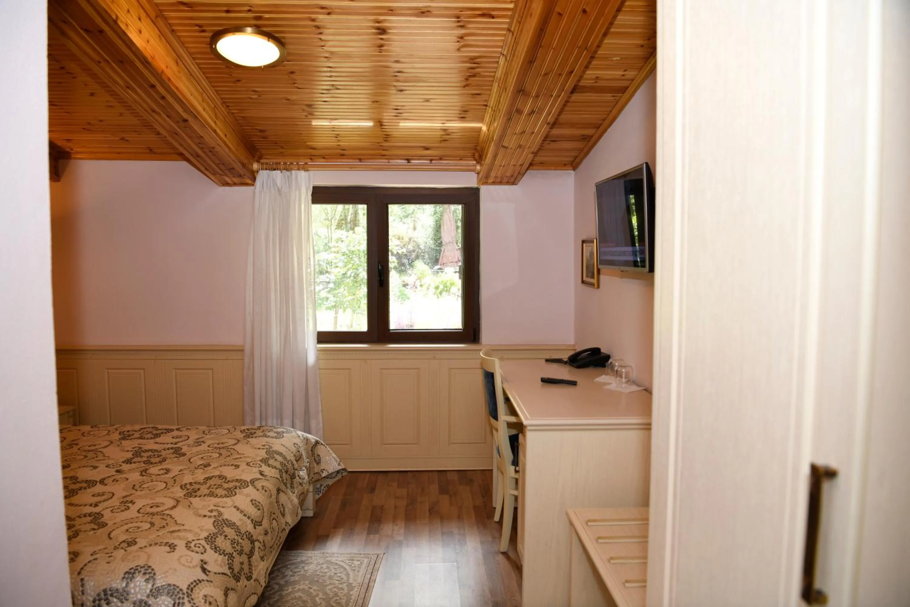 Bed in Hotel Restaurant Dreri