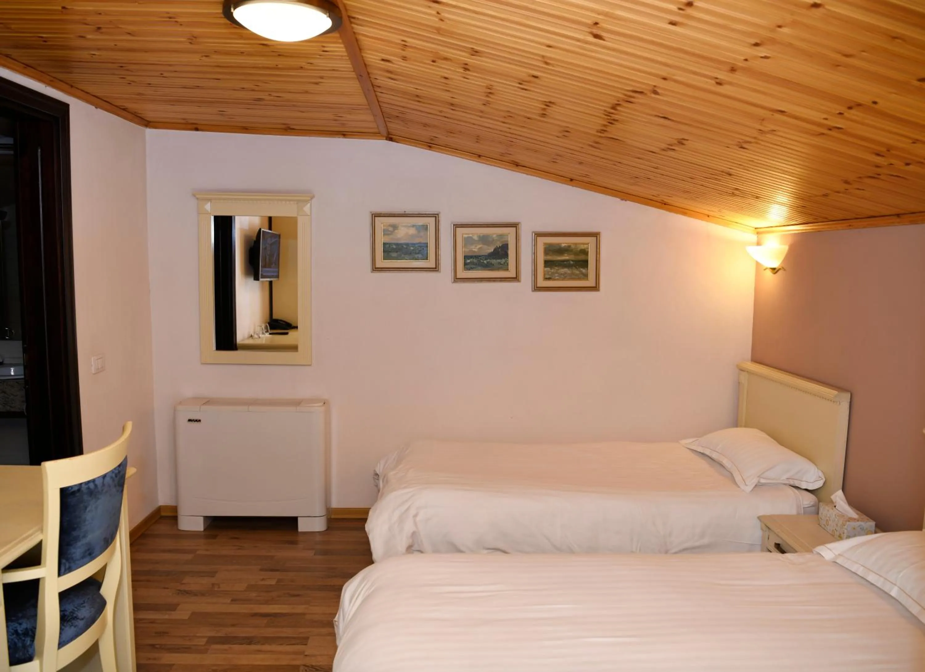 Bed in Hotel Restaurant Dreri