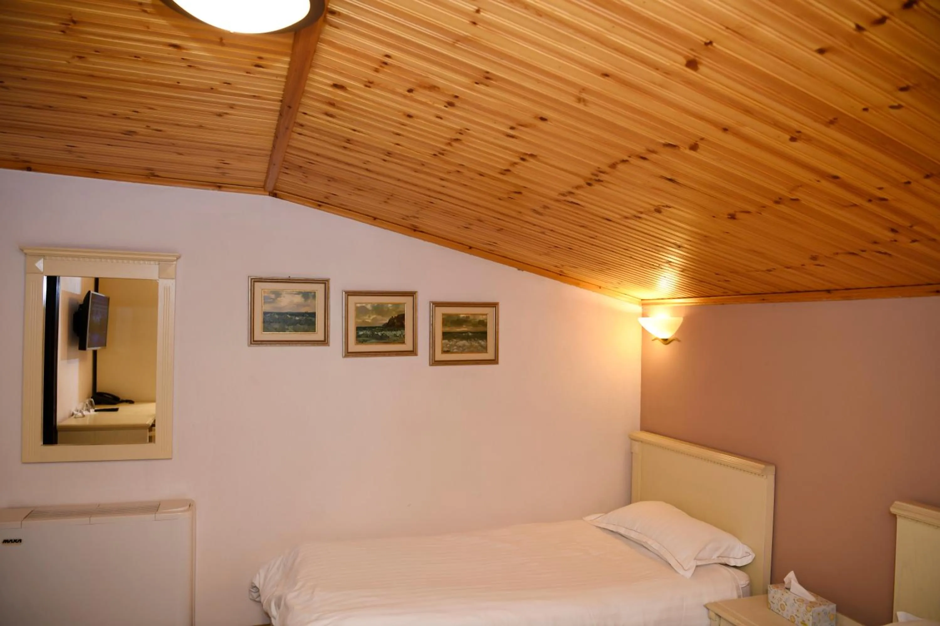 Bed in Hotel Restaurant Dreri
