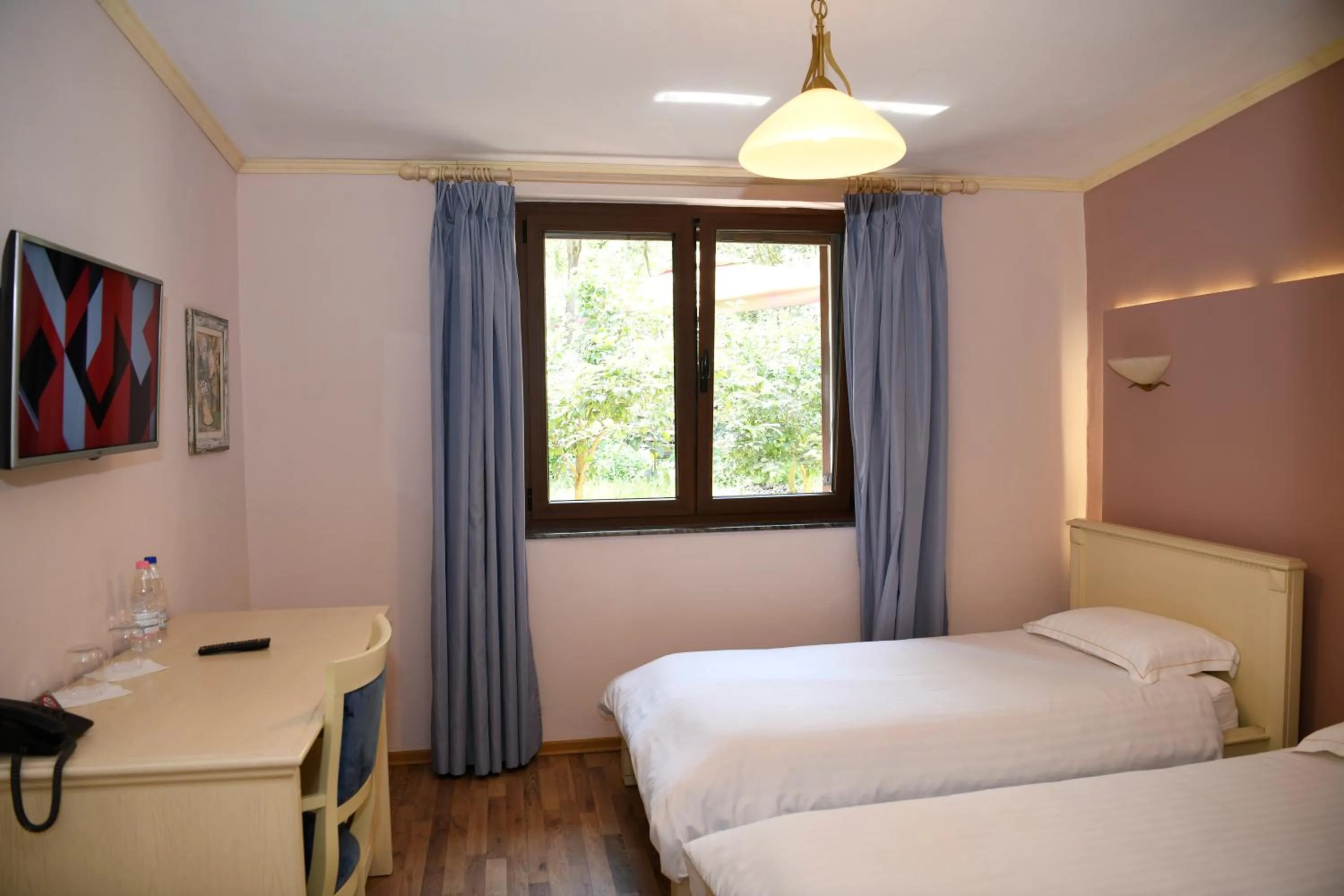 Bed in Hotel Restaurant Dreri