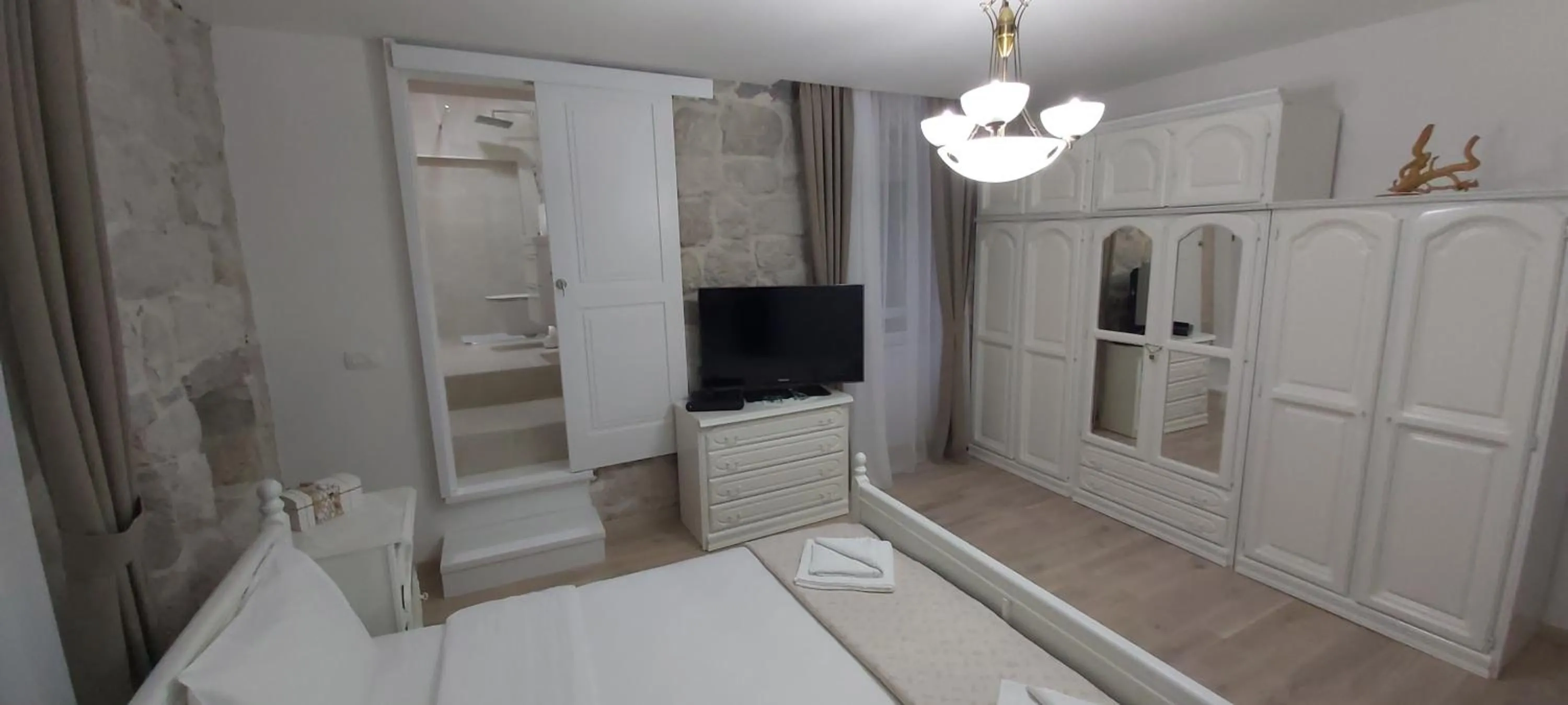 Toilet, Bed in Apartment Kula Đurišić