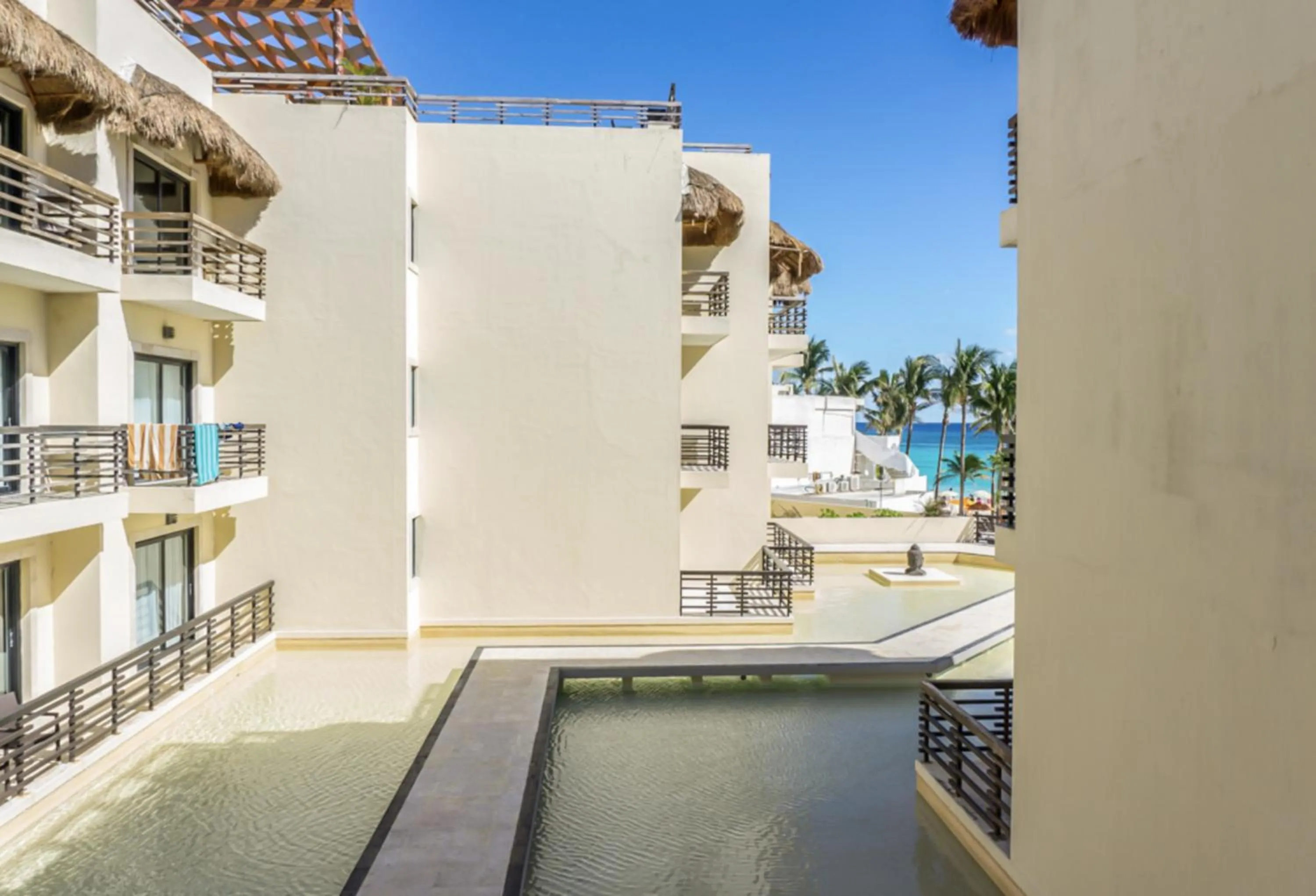 Pool view in Aldea Beachside Condo by BVR