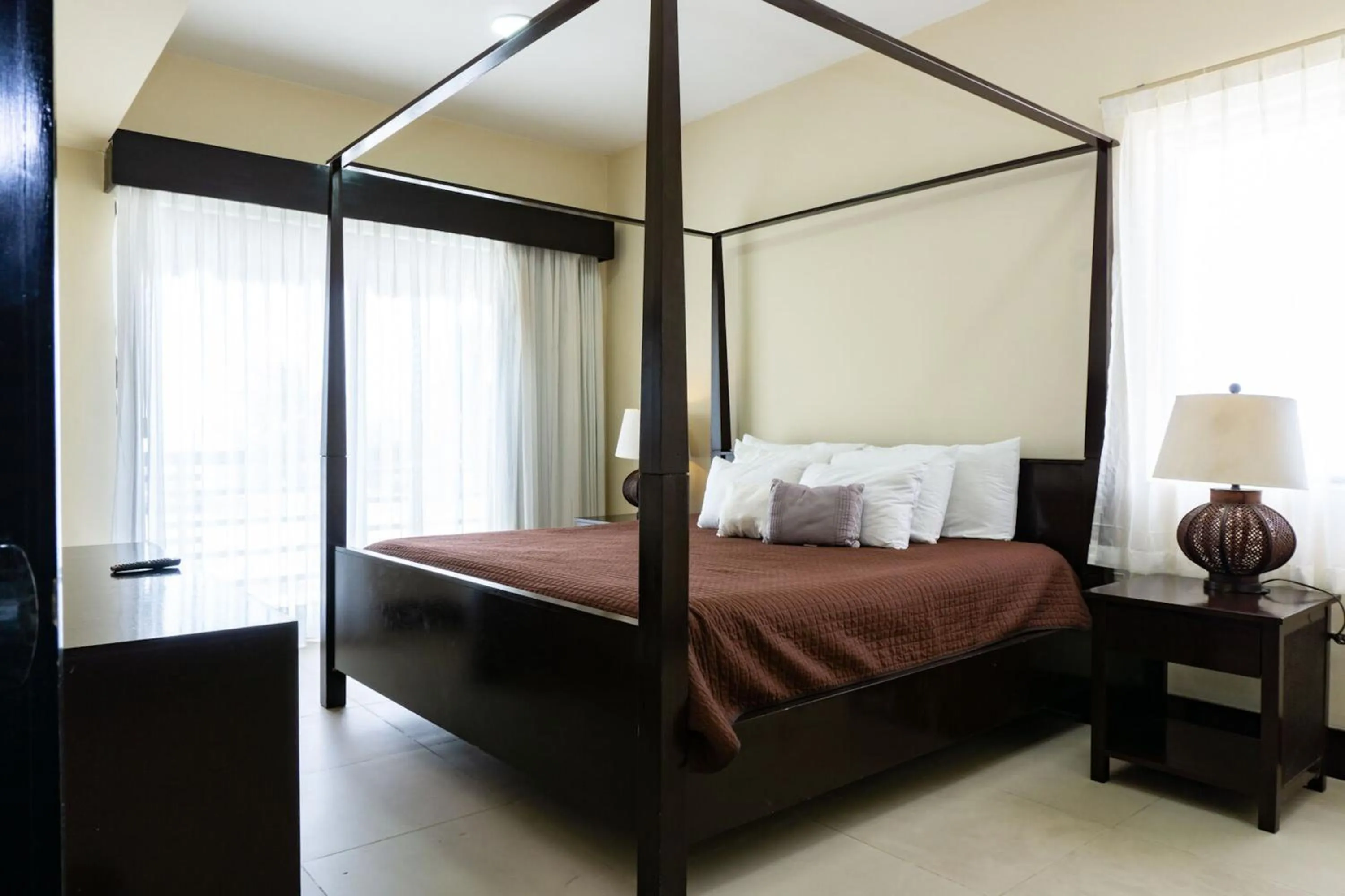 Bed in Aldea Beachside Condo by BVR