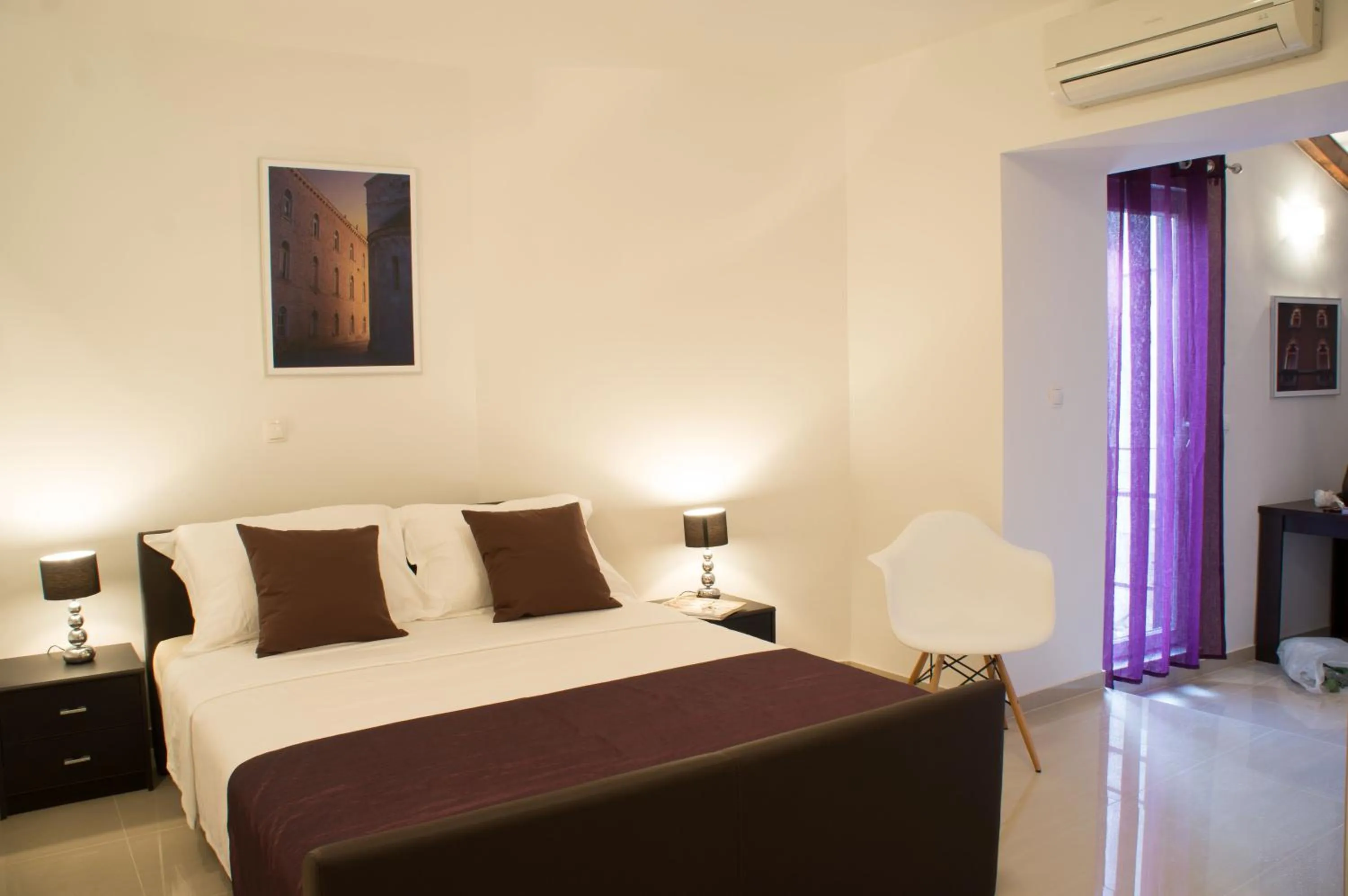 Bed in Split Allure Apartments