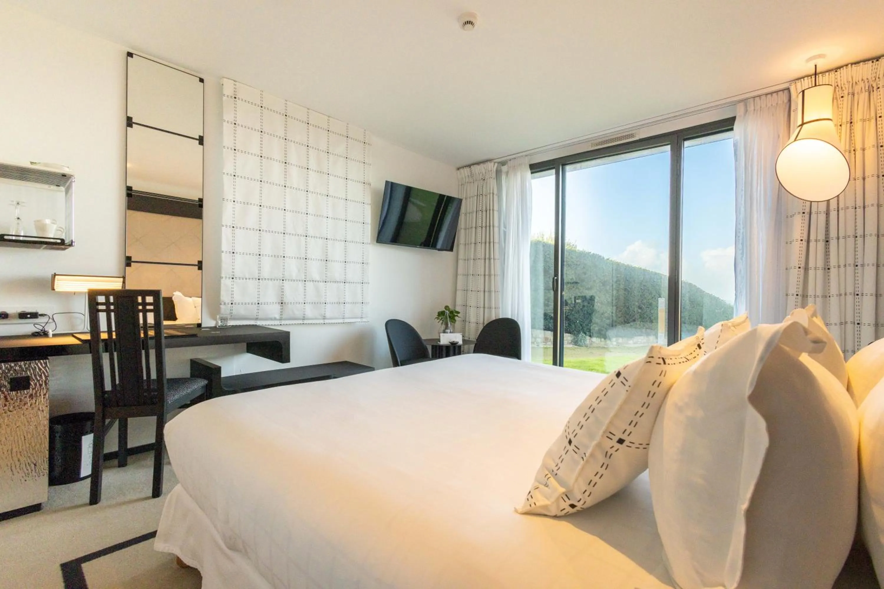 Photo of the whole room, Bed in L'Agapa Hôtel - Spa Codage