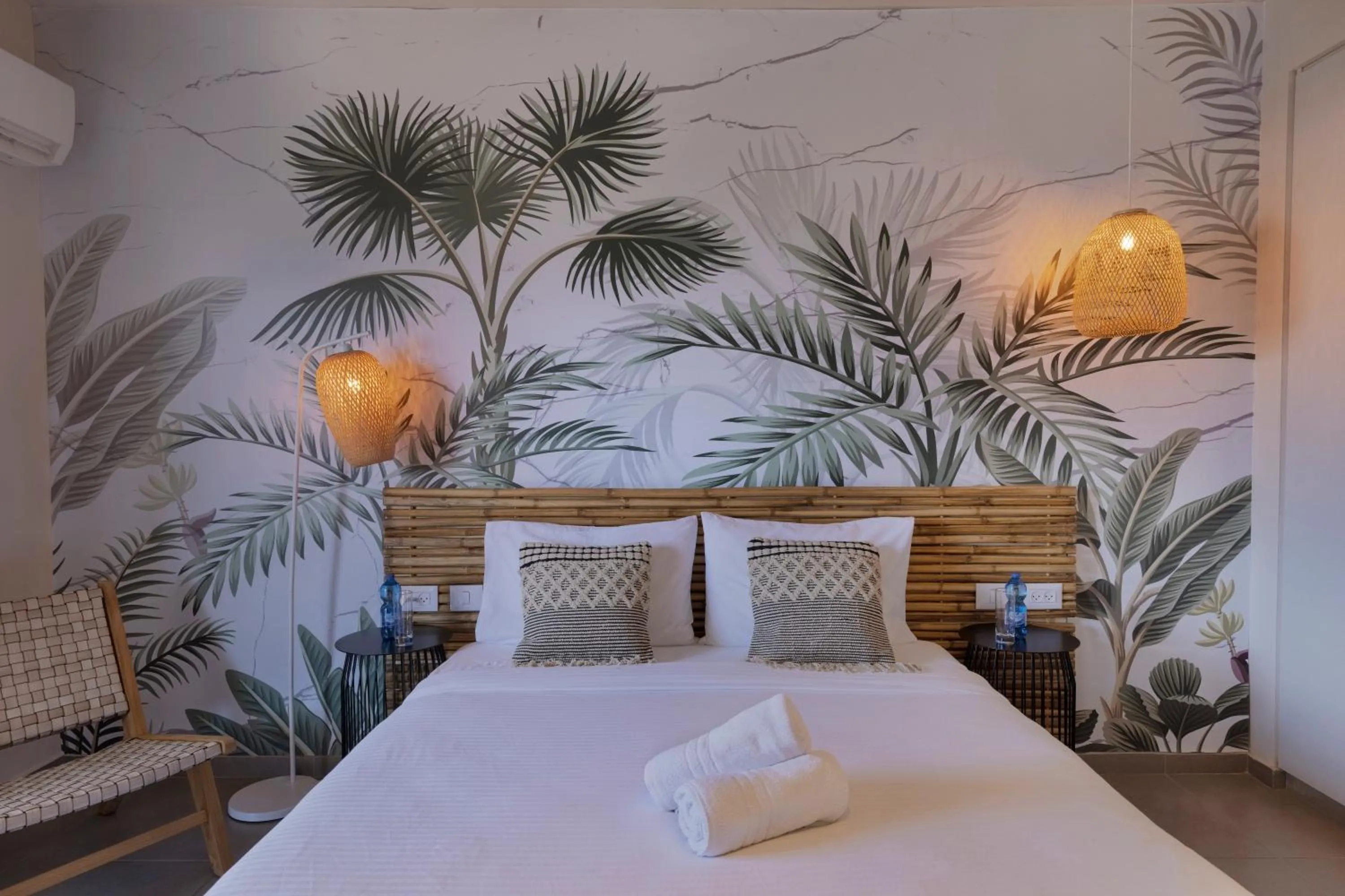 towels, Bed in Almogim Suites Eilat Hotel