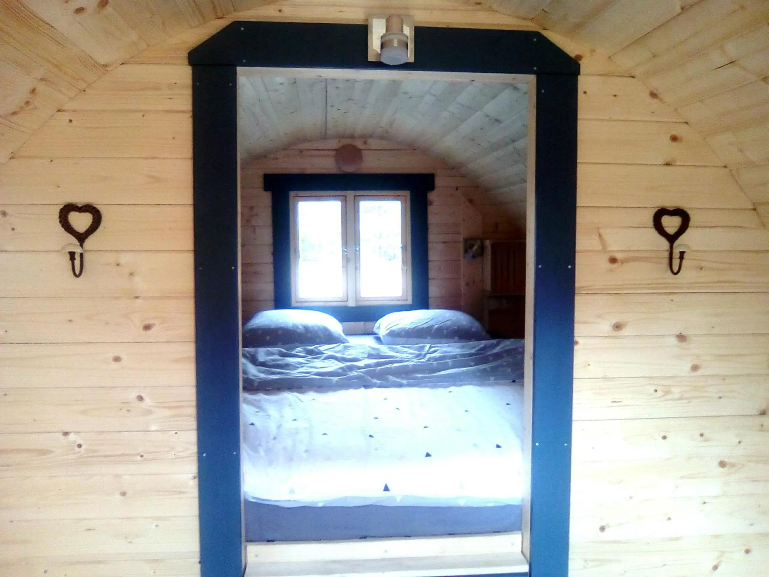 Bed in LES TONNEAUX DE L'EURE LOGEMENT INSOLITE