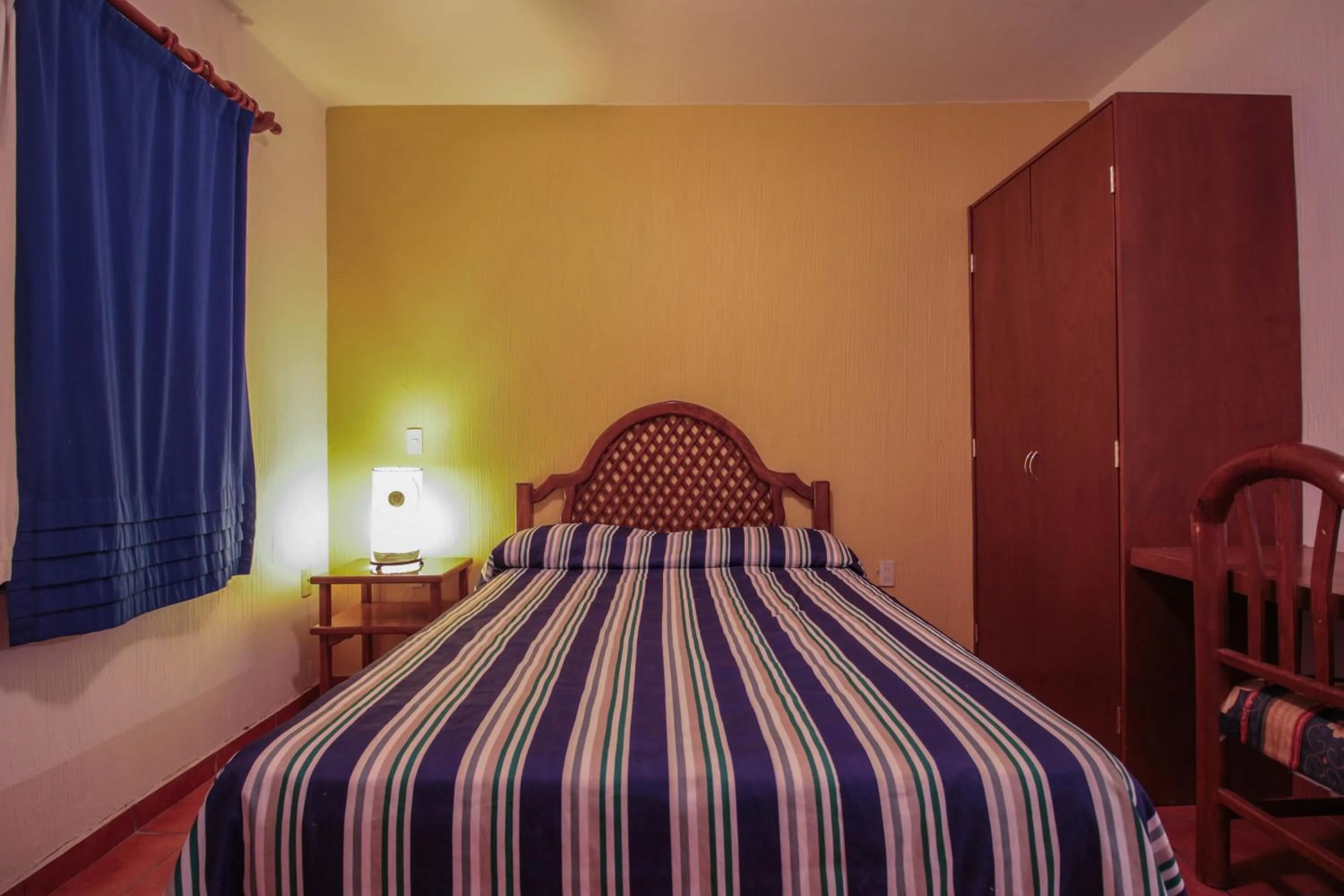 Bed in Hotel Degollado