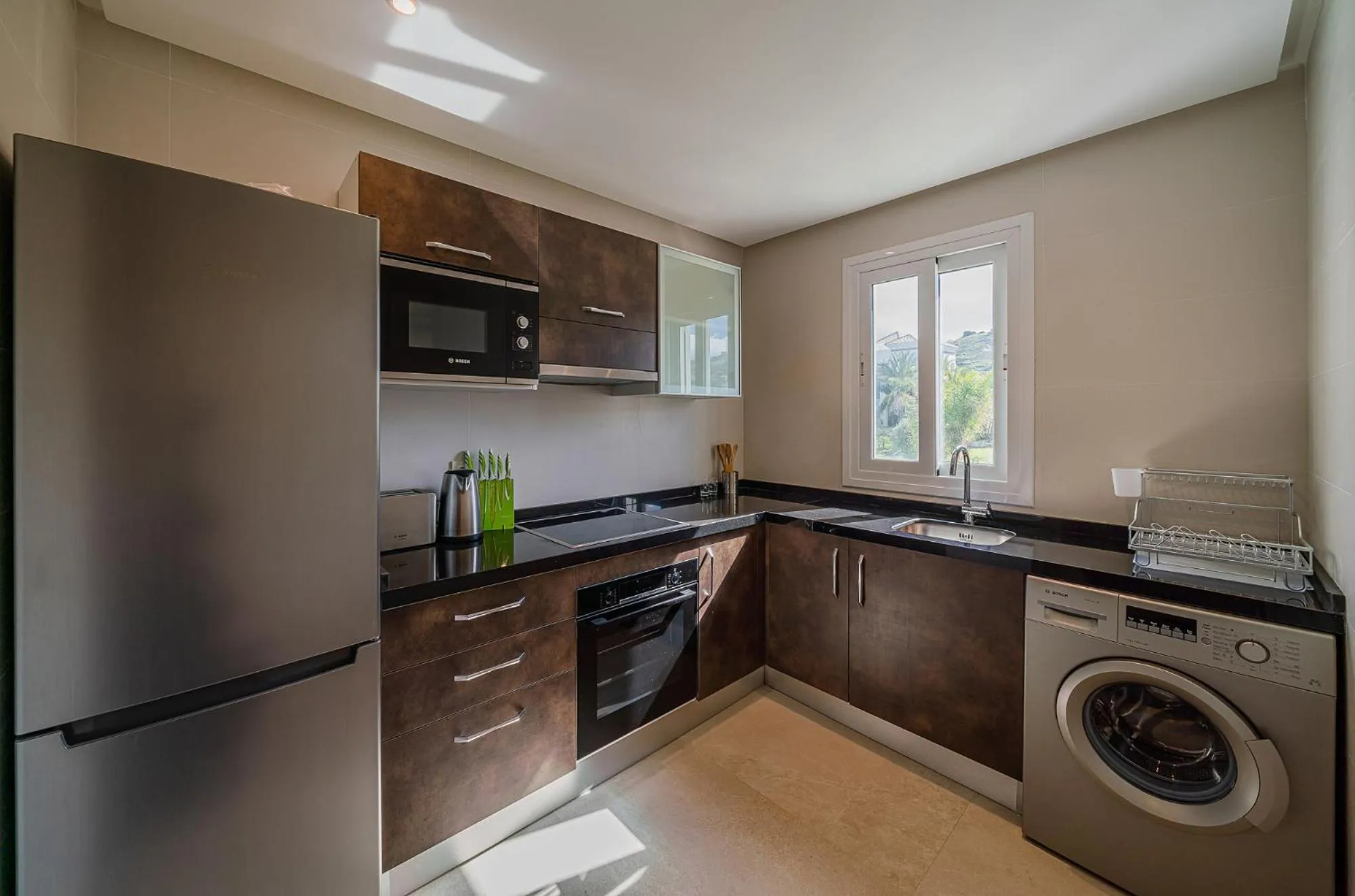 Kitchen or kitchenette in Le Tanger Résidence Hôtelière