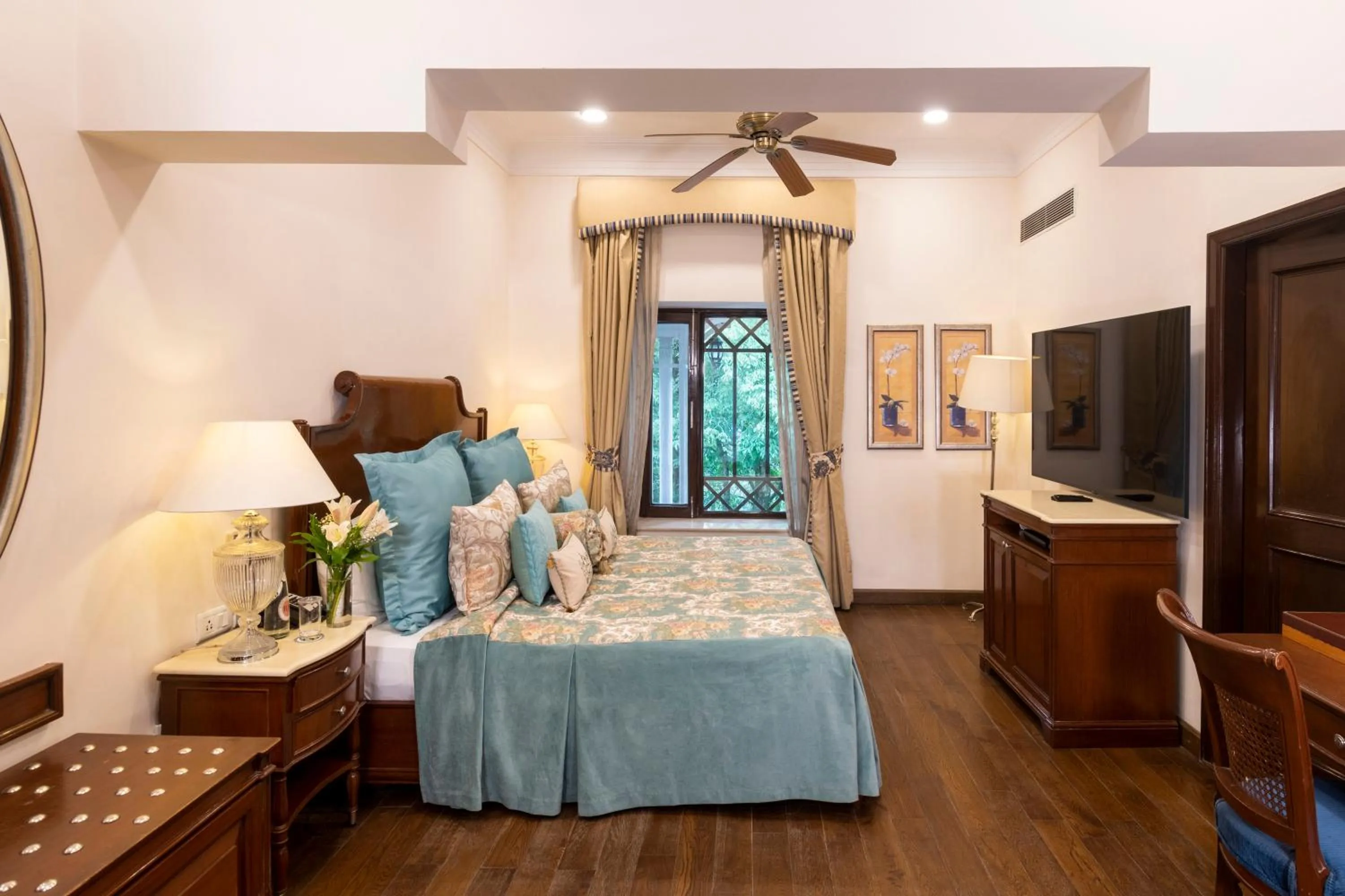 Photo of the whole room, Bed in The Claridges Nabha Residence