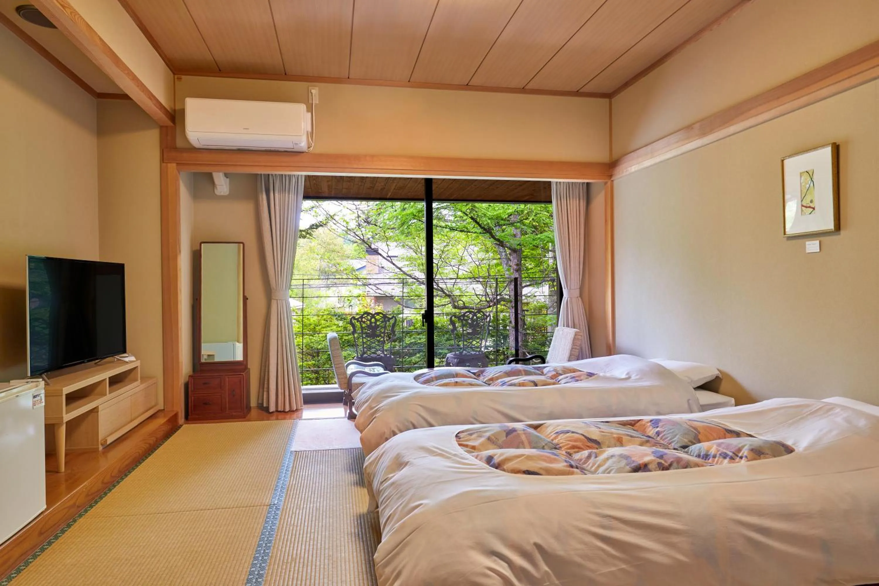 Bed in IKOI Villa
