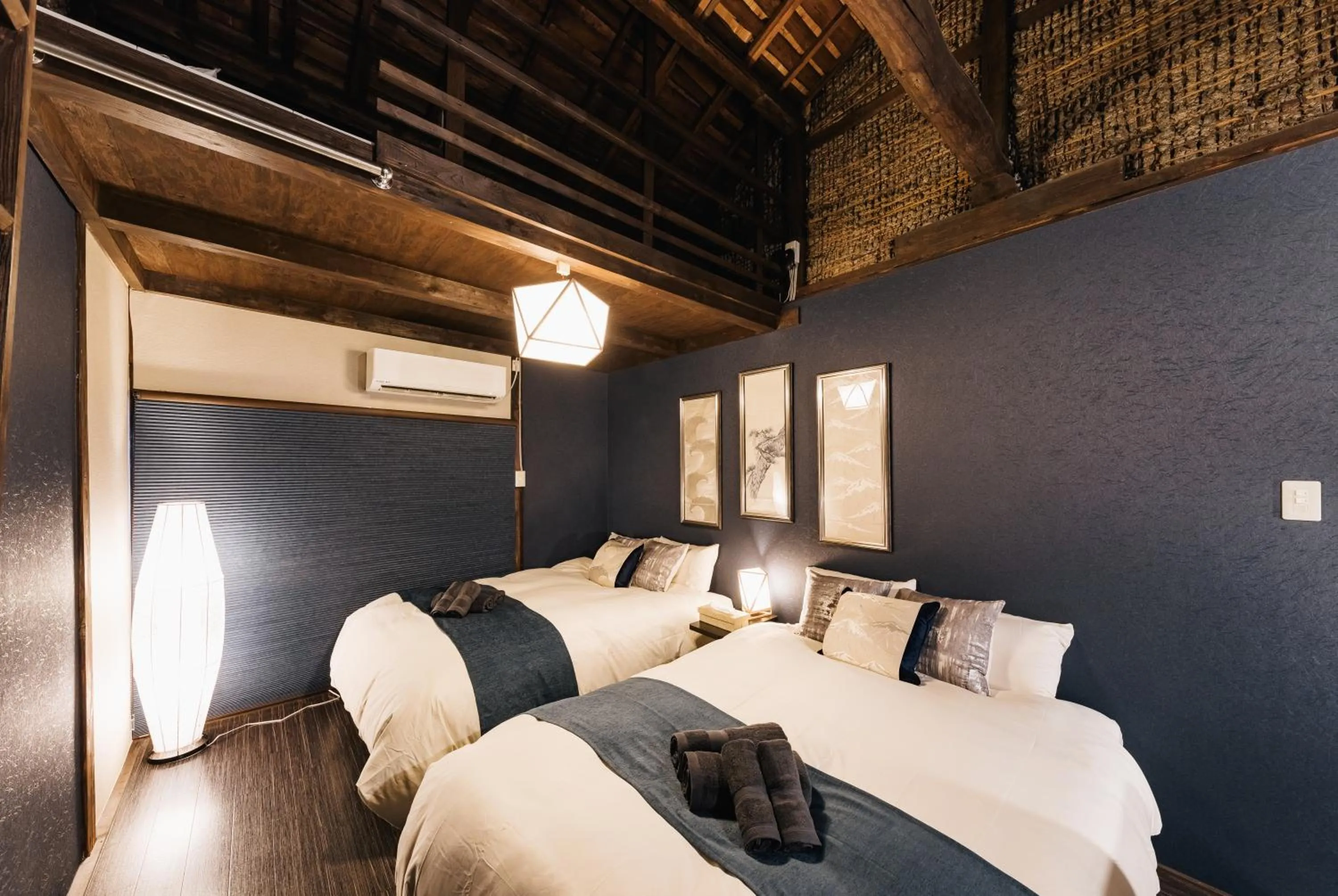 Bed in Prestige Suites Osaka Teradacho