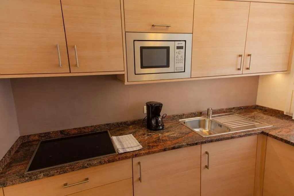 Kitchen or kitchenette in Residence Armonia