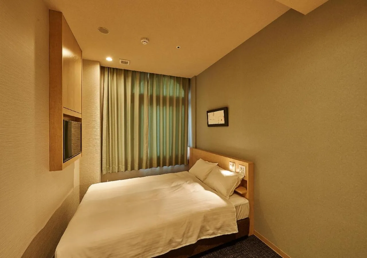 Bed in Welina Hotel Premier Nakanoshima EAST