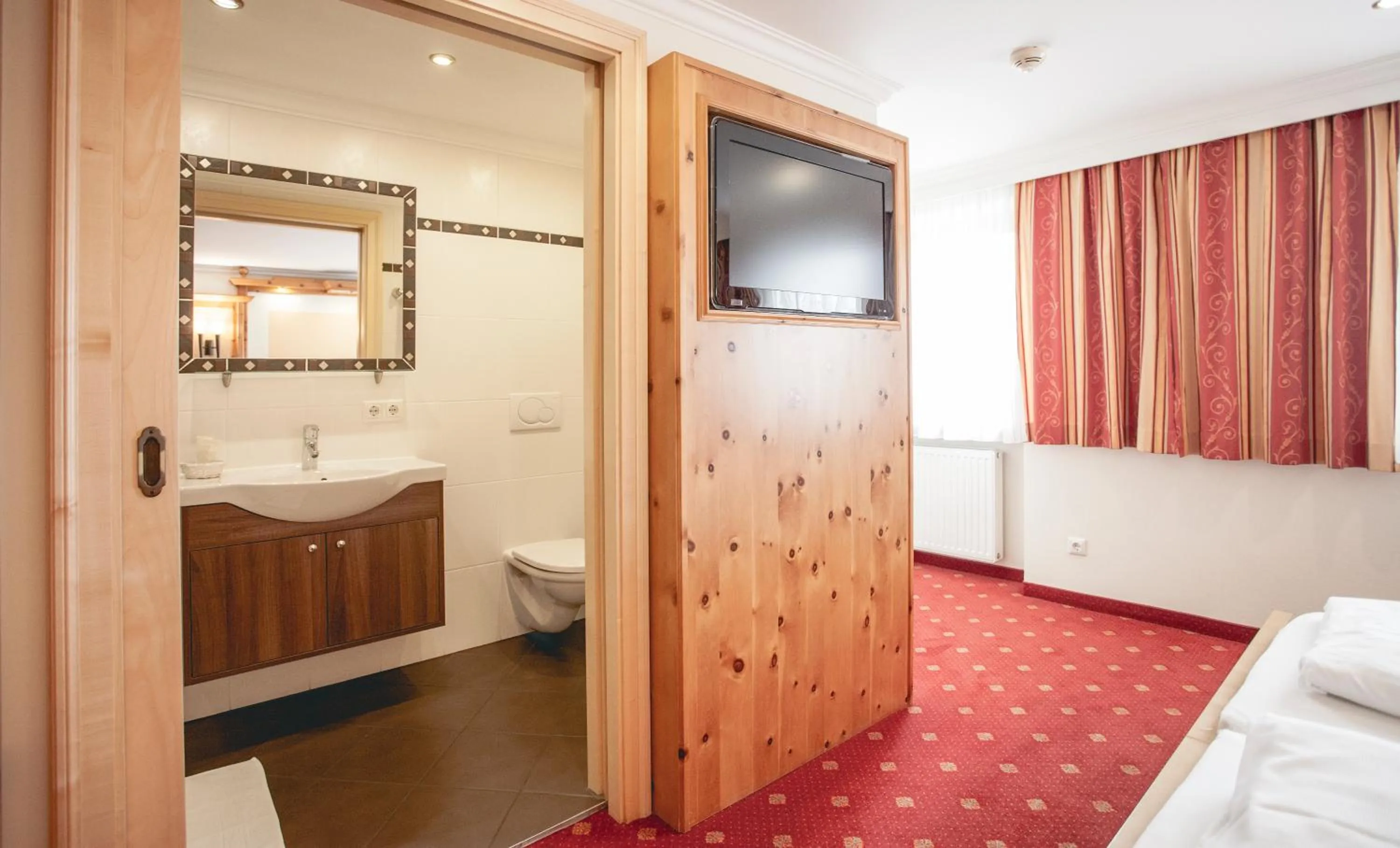 Bathroom, Bed in Gasthof Schmalzerhof
