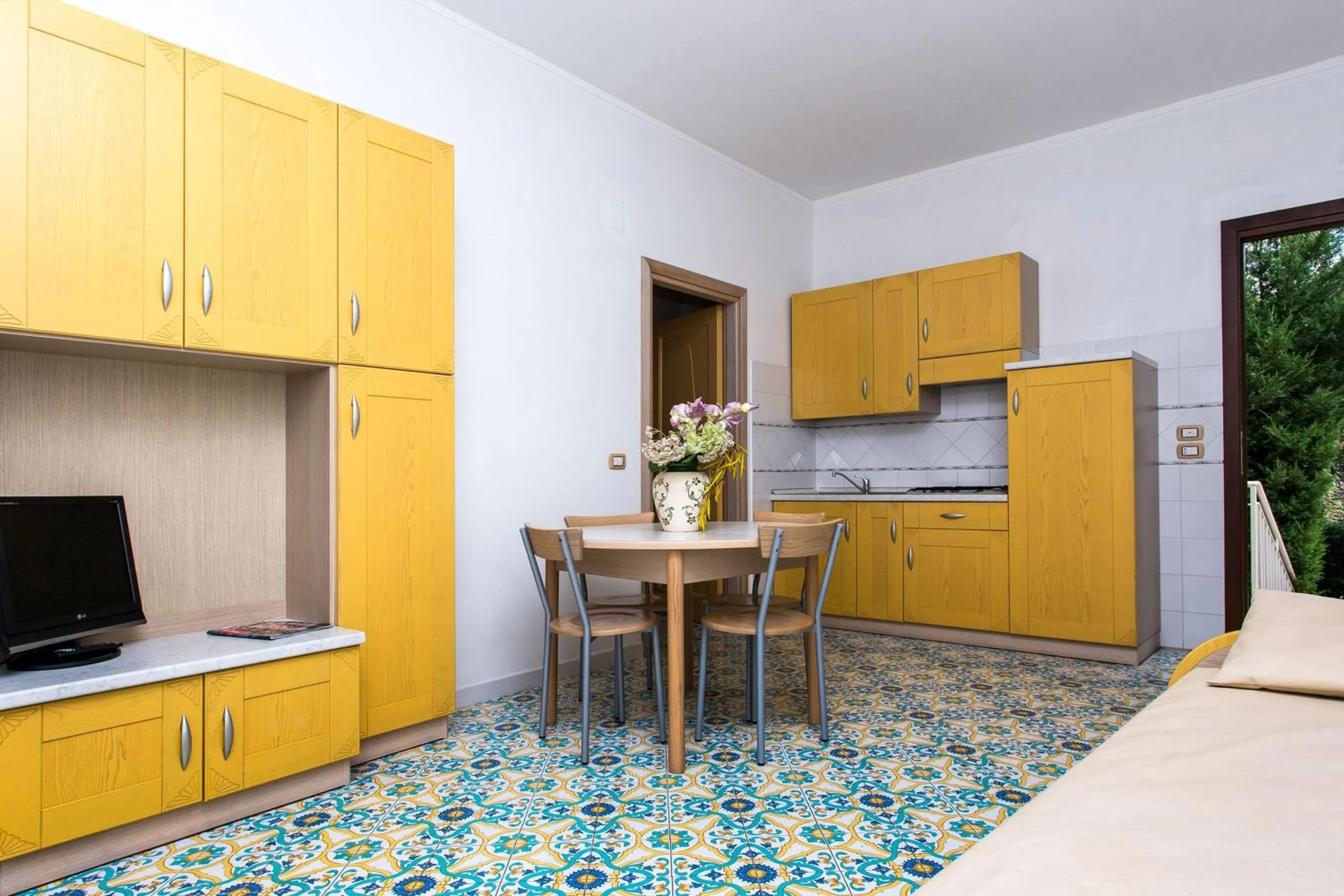 Kitchen or kitchenette in Club Residence La Castellana Mare
