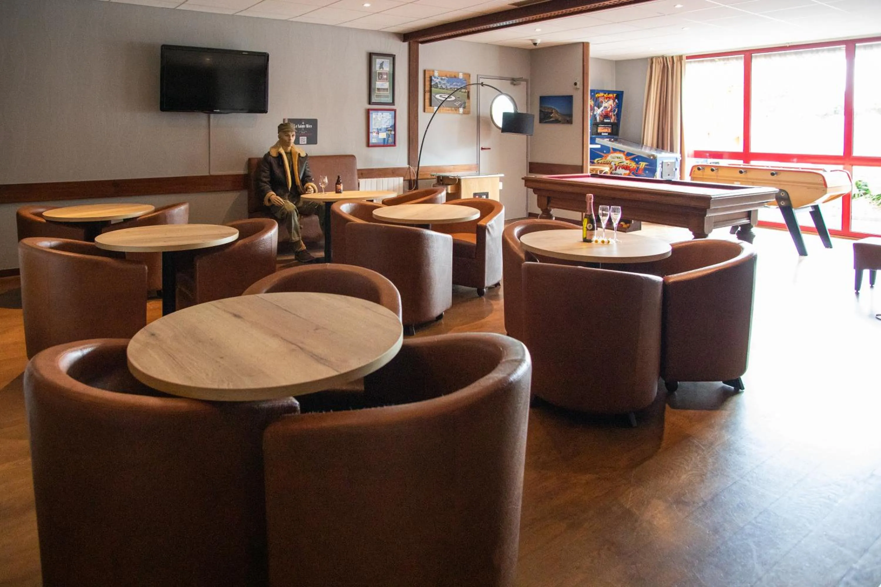 Living room in Logis Hôtel Restaurant Le Sainte Mère