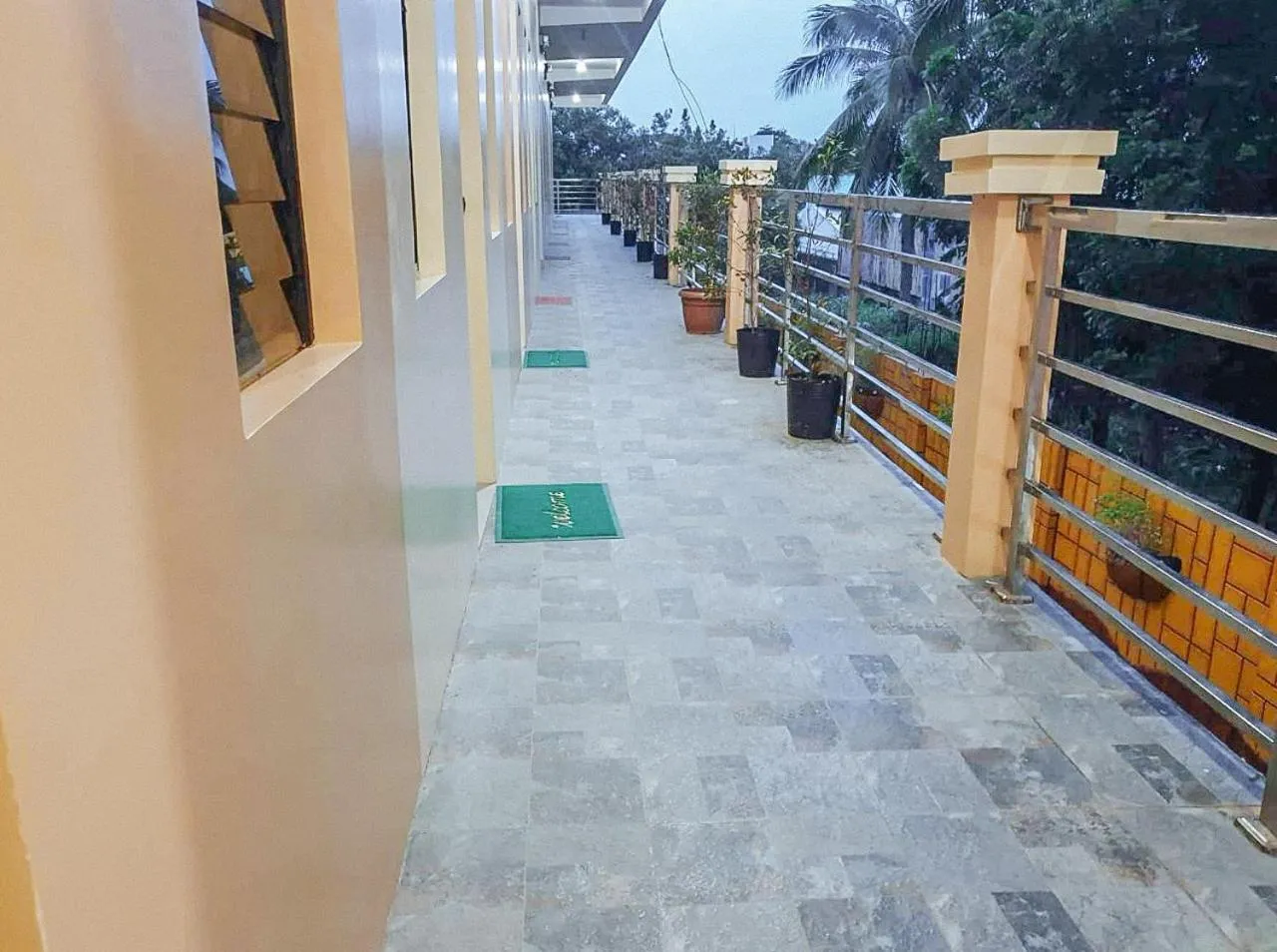 Property building, Balcony/Terrace in RedDoorz near SGM Condotel Villa Beach Iloilo