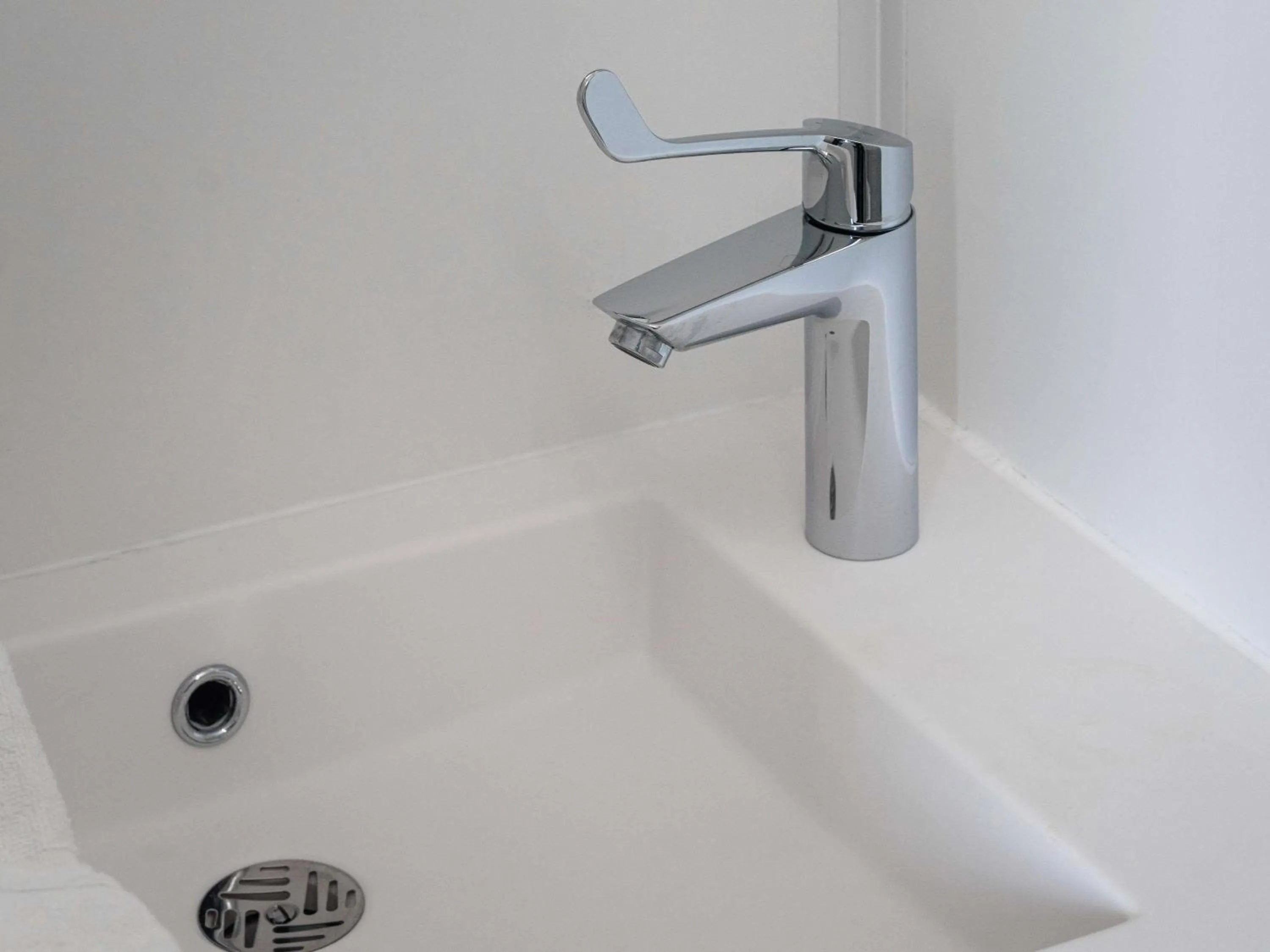 Bedroom in ibis Budget Mâcon Sud