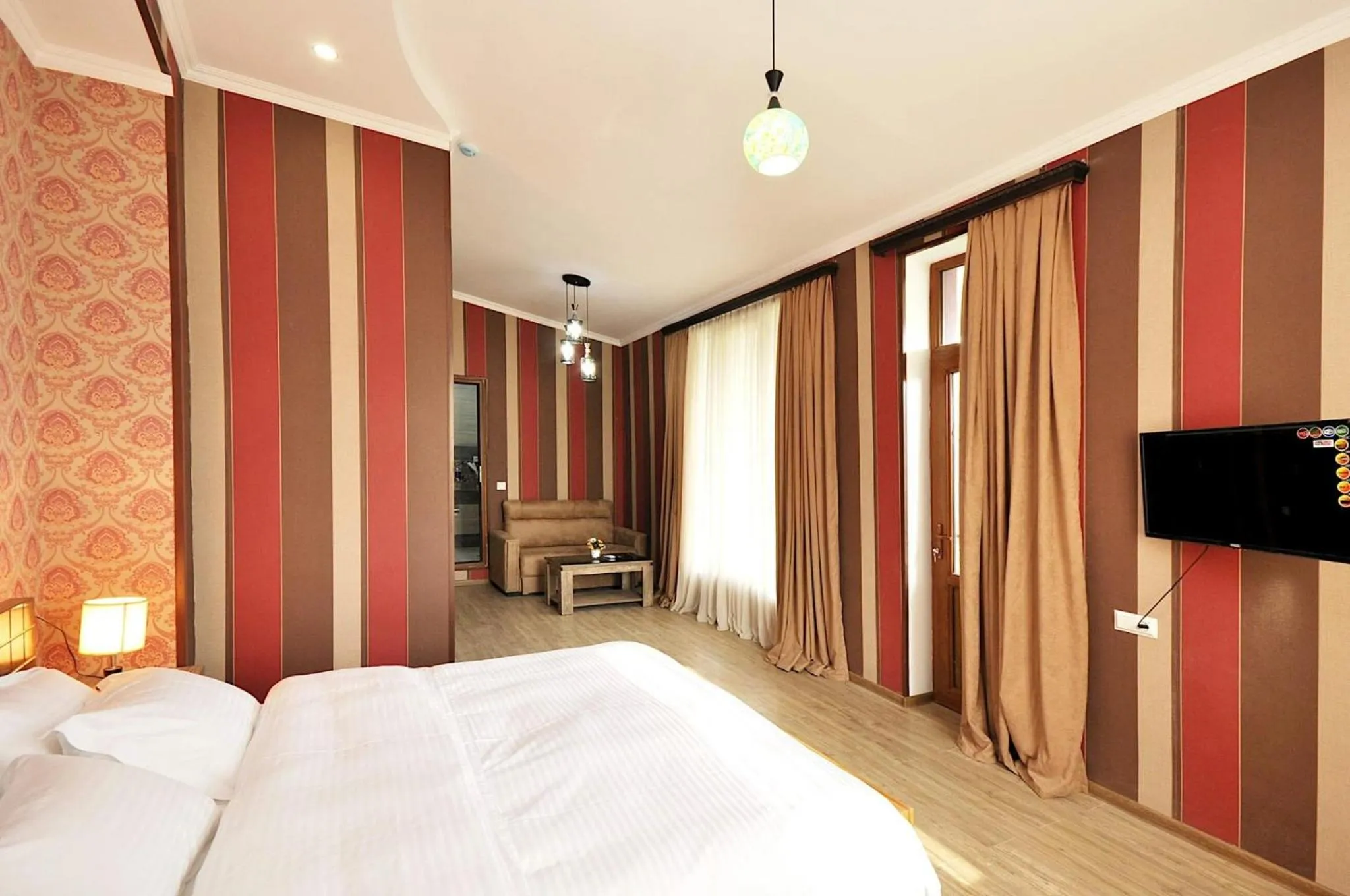 Communal lounge/ TV room, Bed in BERIKA HOUSE