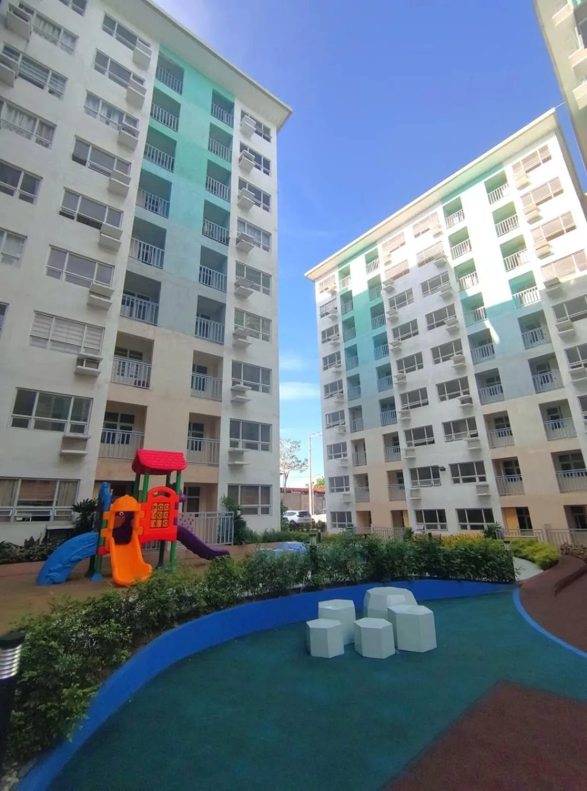 Children play ground in Davao Condo 2BR Pool Wifi Netflix