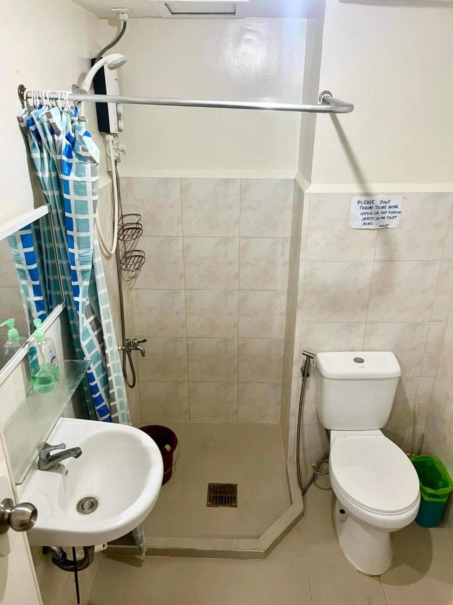 Shower in Davao Condo 2BR Pool Wifi Netflix