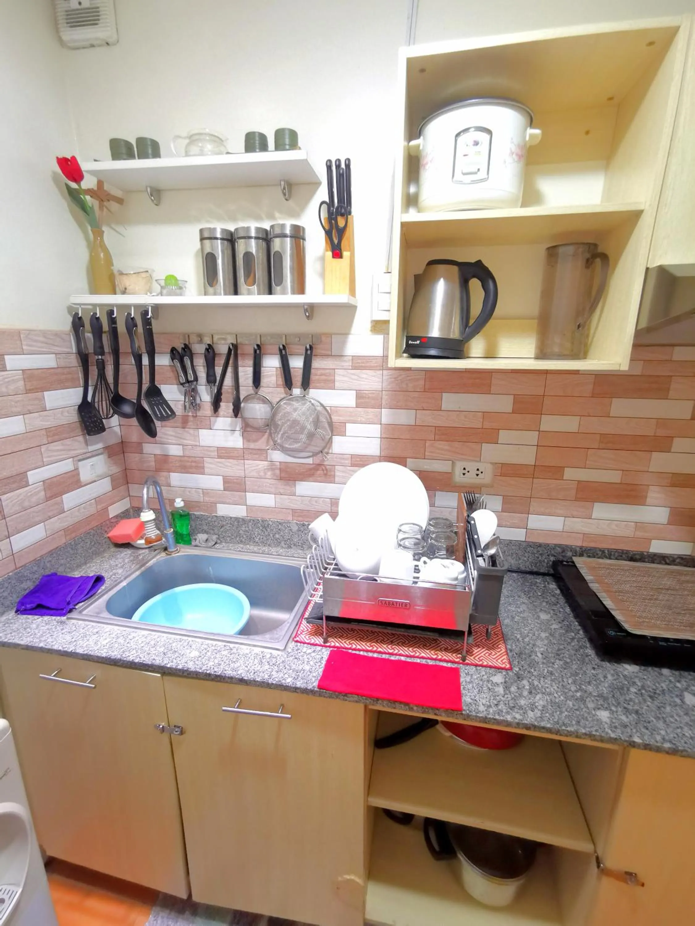 Kitchen or kitchenette in Davao Condo 2BR Pool Wifi Netflix