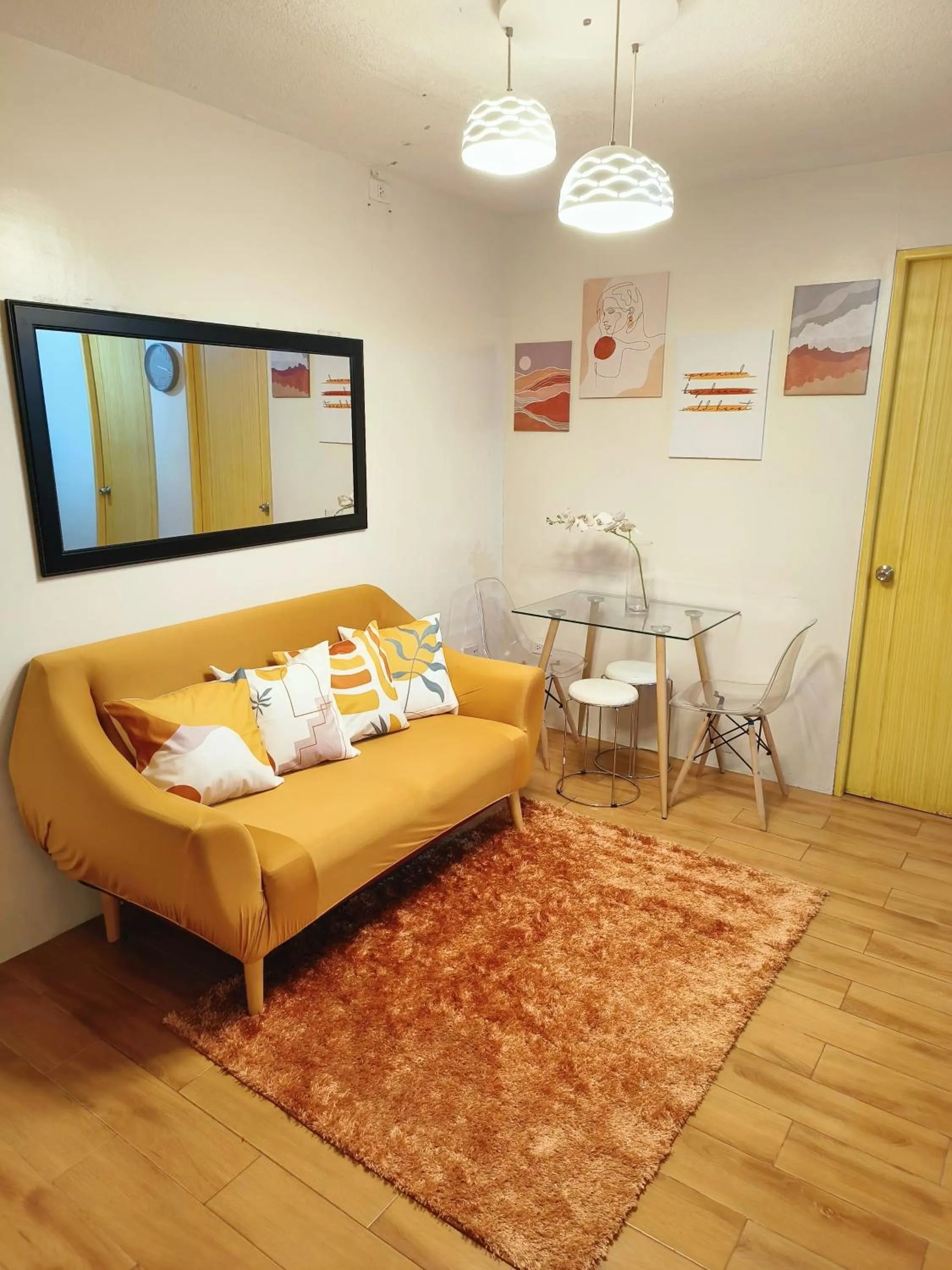 Living room in Davao Condo 2BR Pool Wifi Netflix