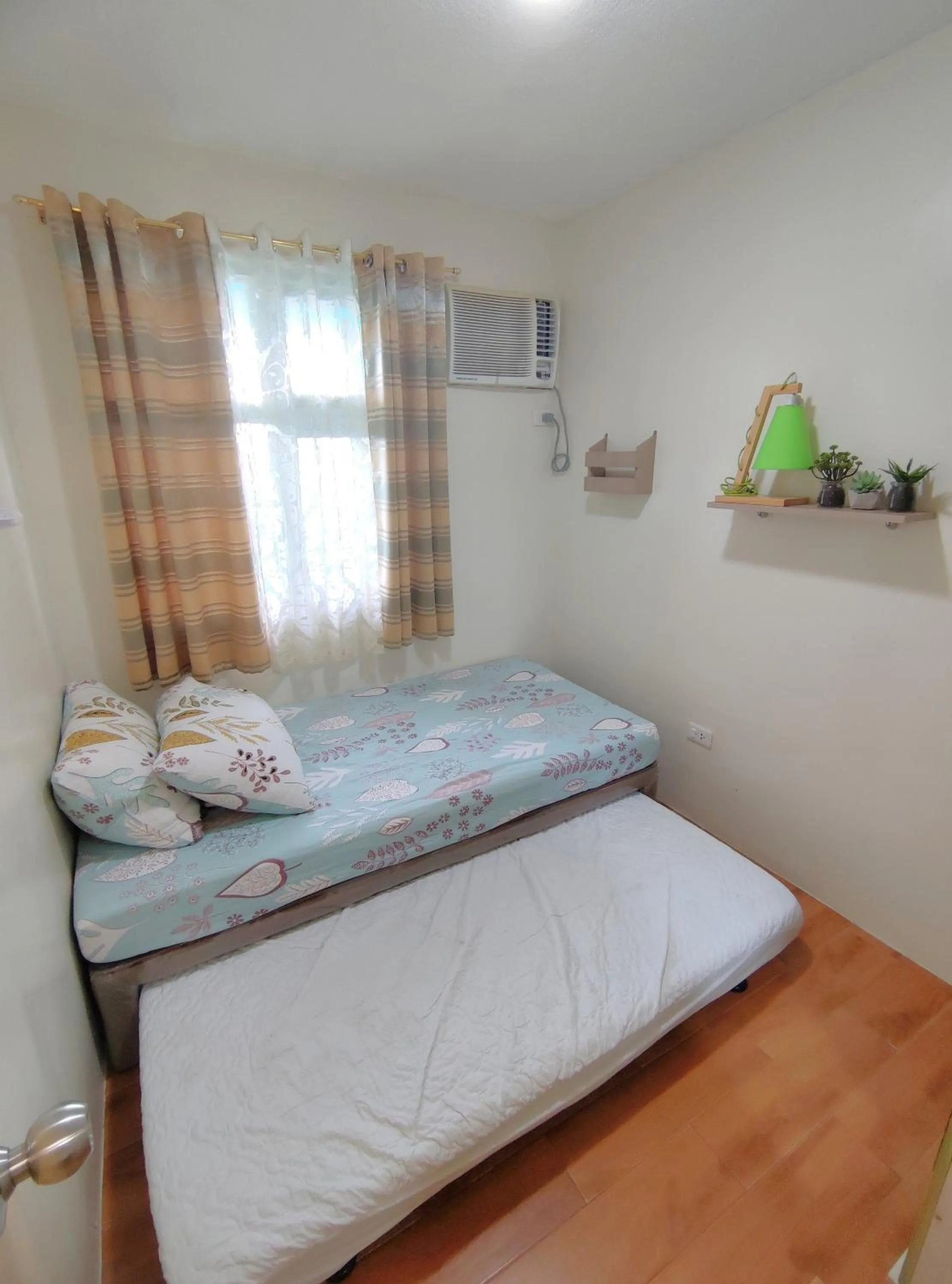 Bed in Davao Condo 2BR Pool Wifi Netflix