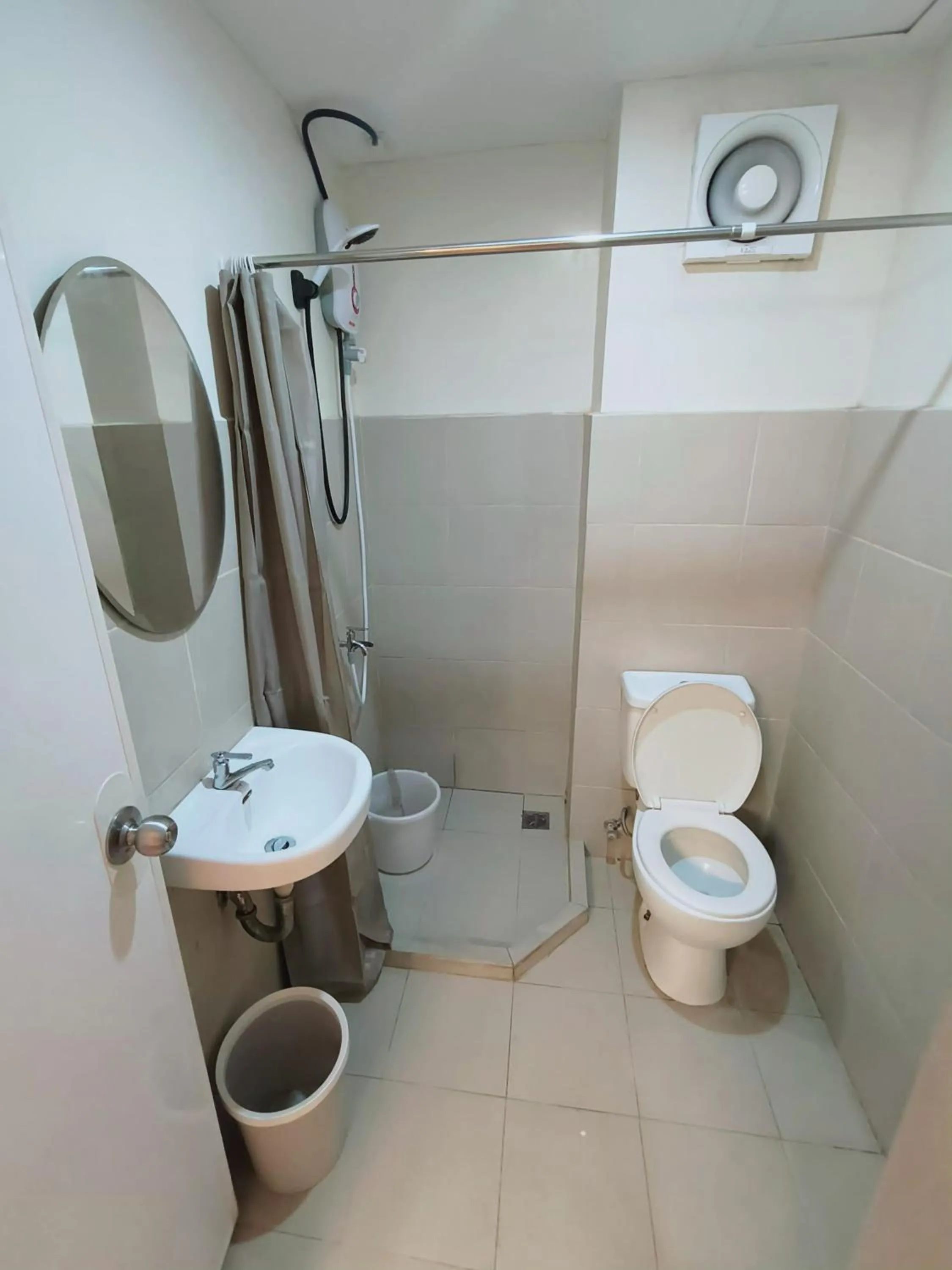 Shower in Davao Condo 2BR Pool Wifi Netflix