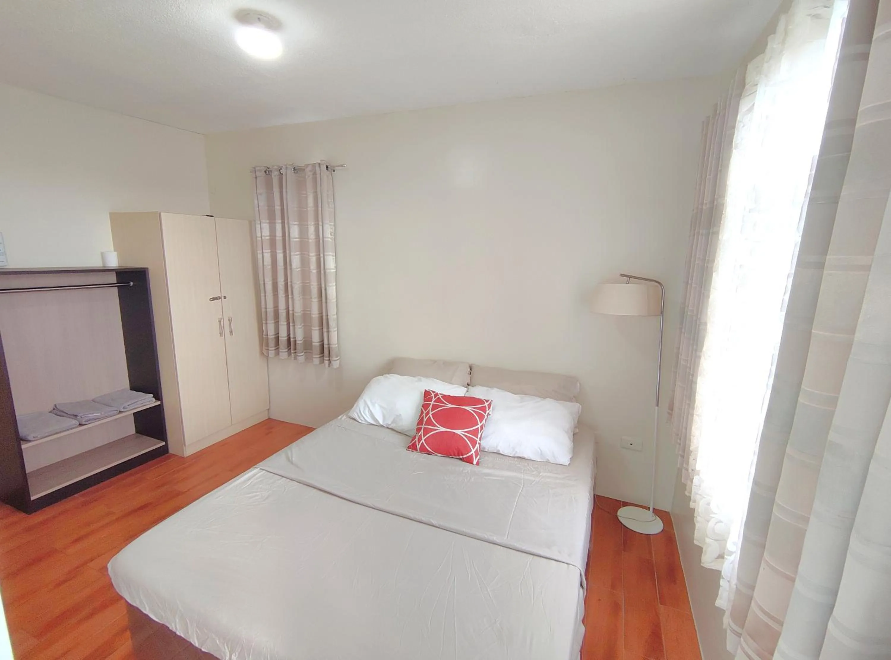 Bed in Davao Condo 2BR Pool Wifi Netflix