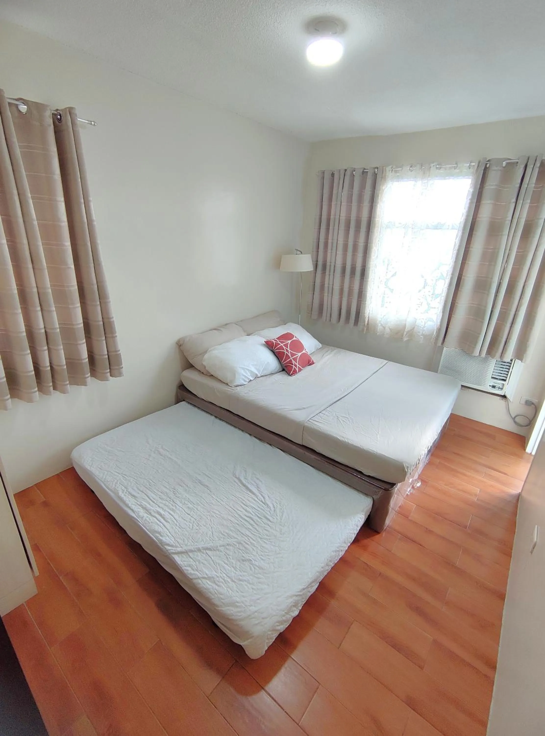 Bed in Davao Condo 2BR Pool Wifi Netflix