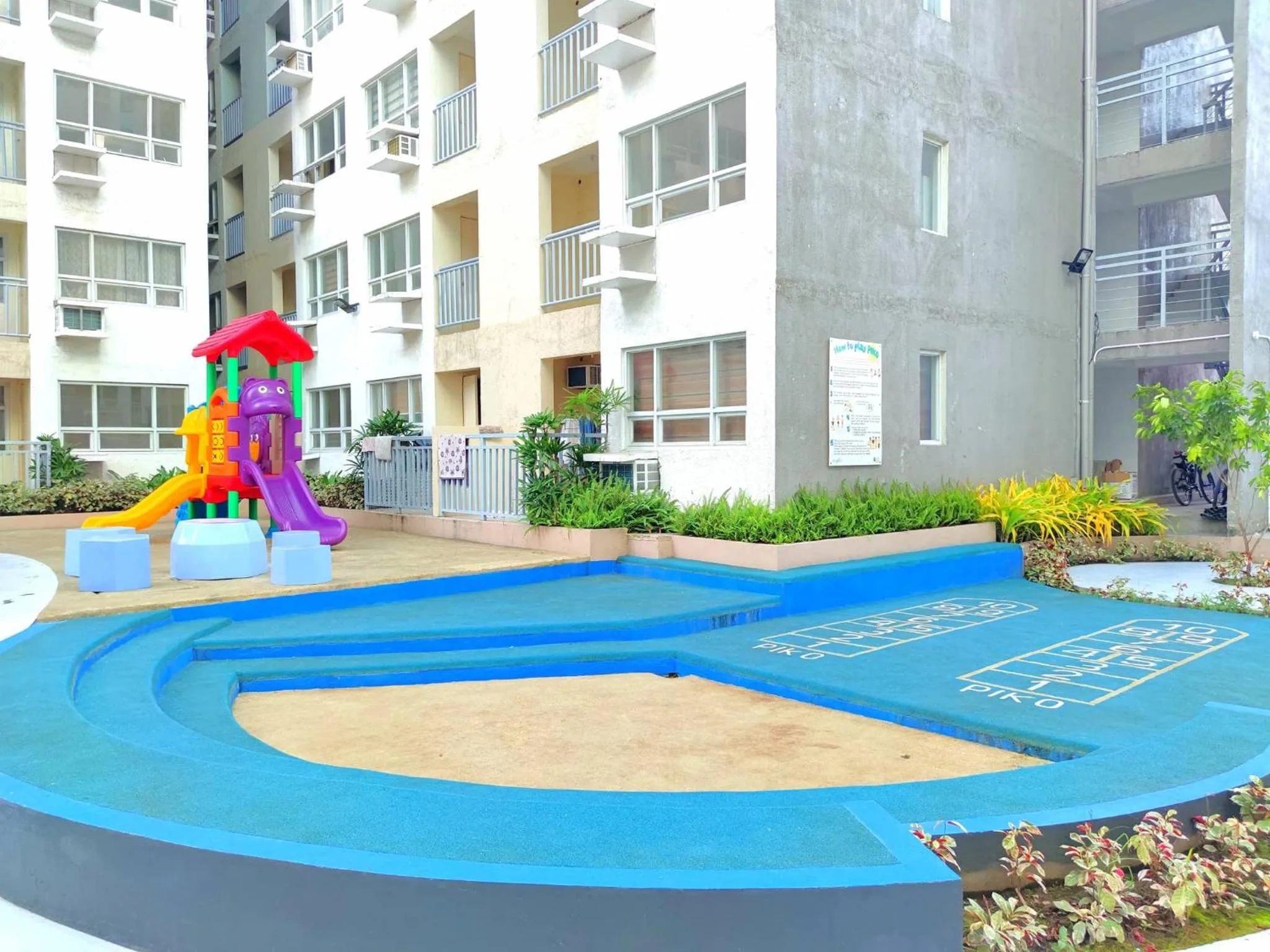 Children play ground in Davao Condo 2BR Pool Wifi Netflix