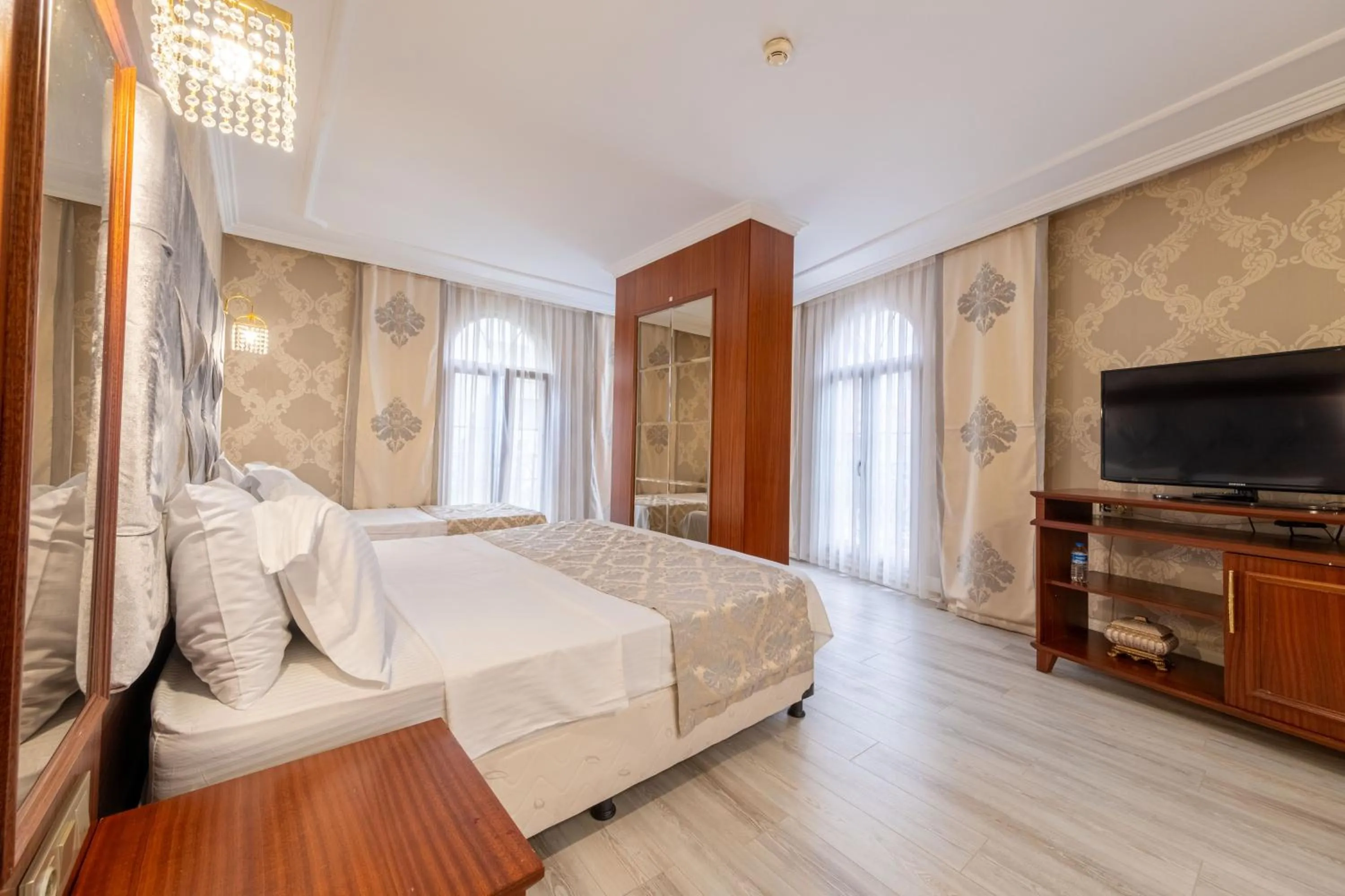 Bed in Myy Boutique Hotel