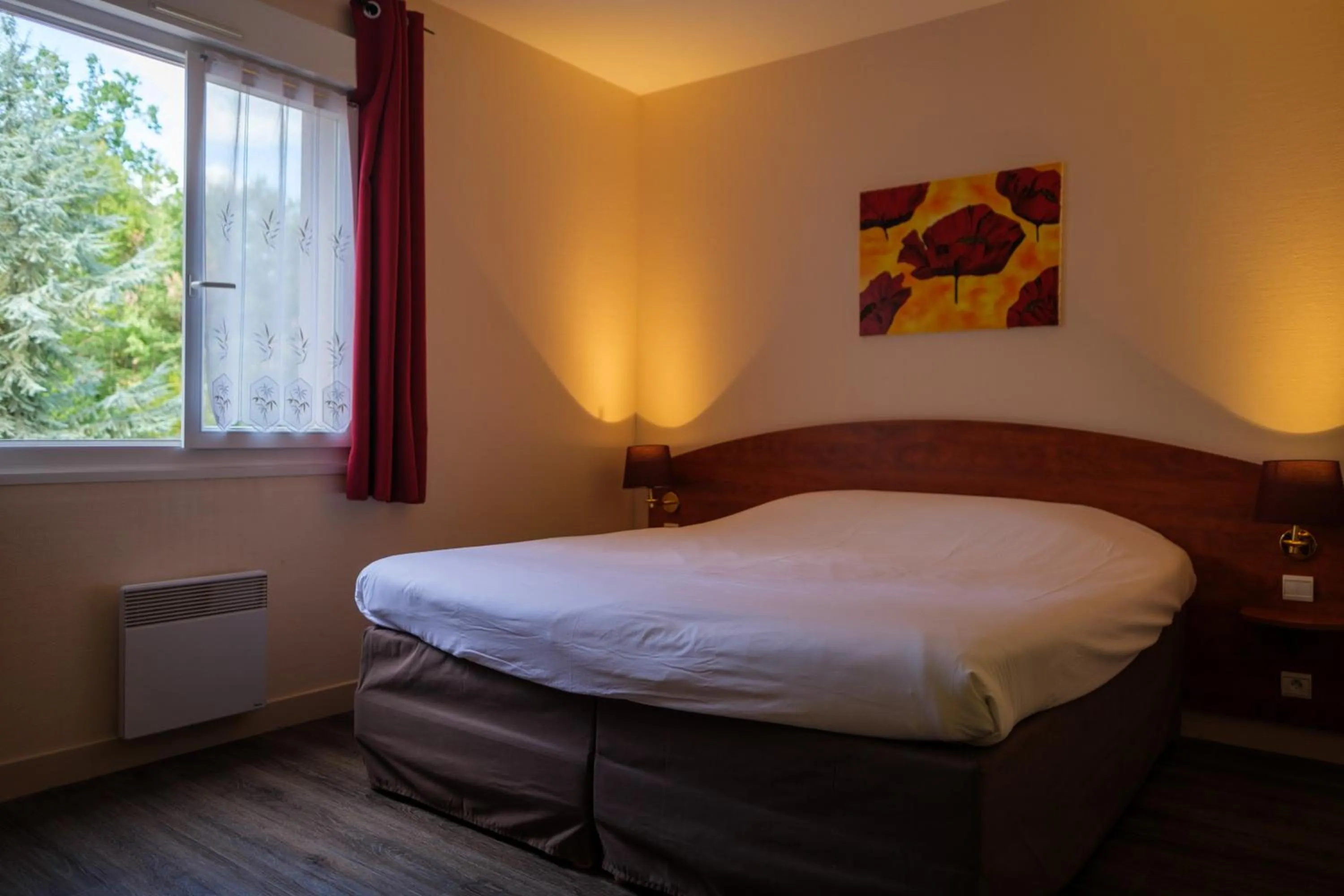 Bedroom, Bed in Logis Hôtel - Restaurant Le Tulipier