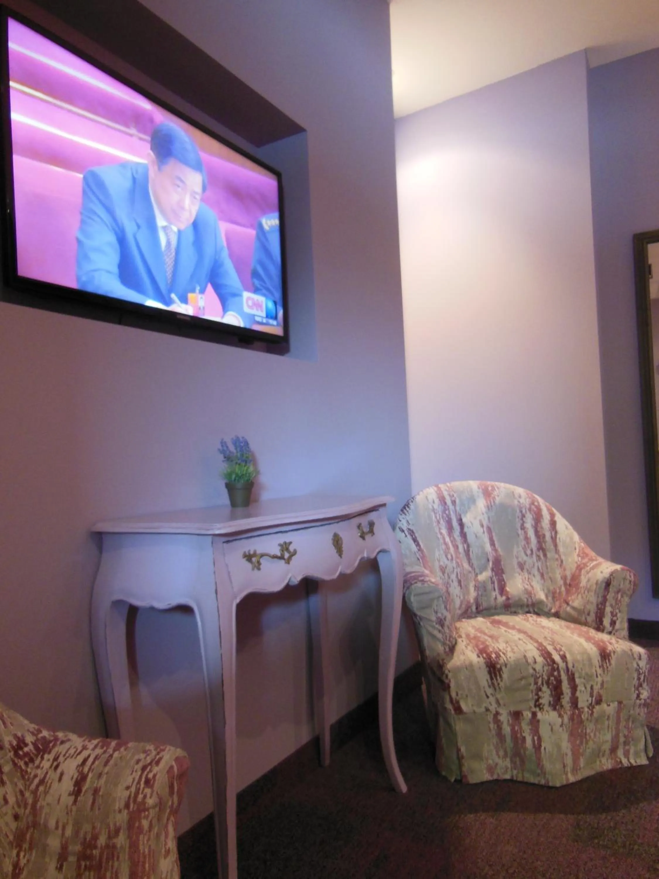 Seating area in Logis Hôtel Le Glacier