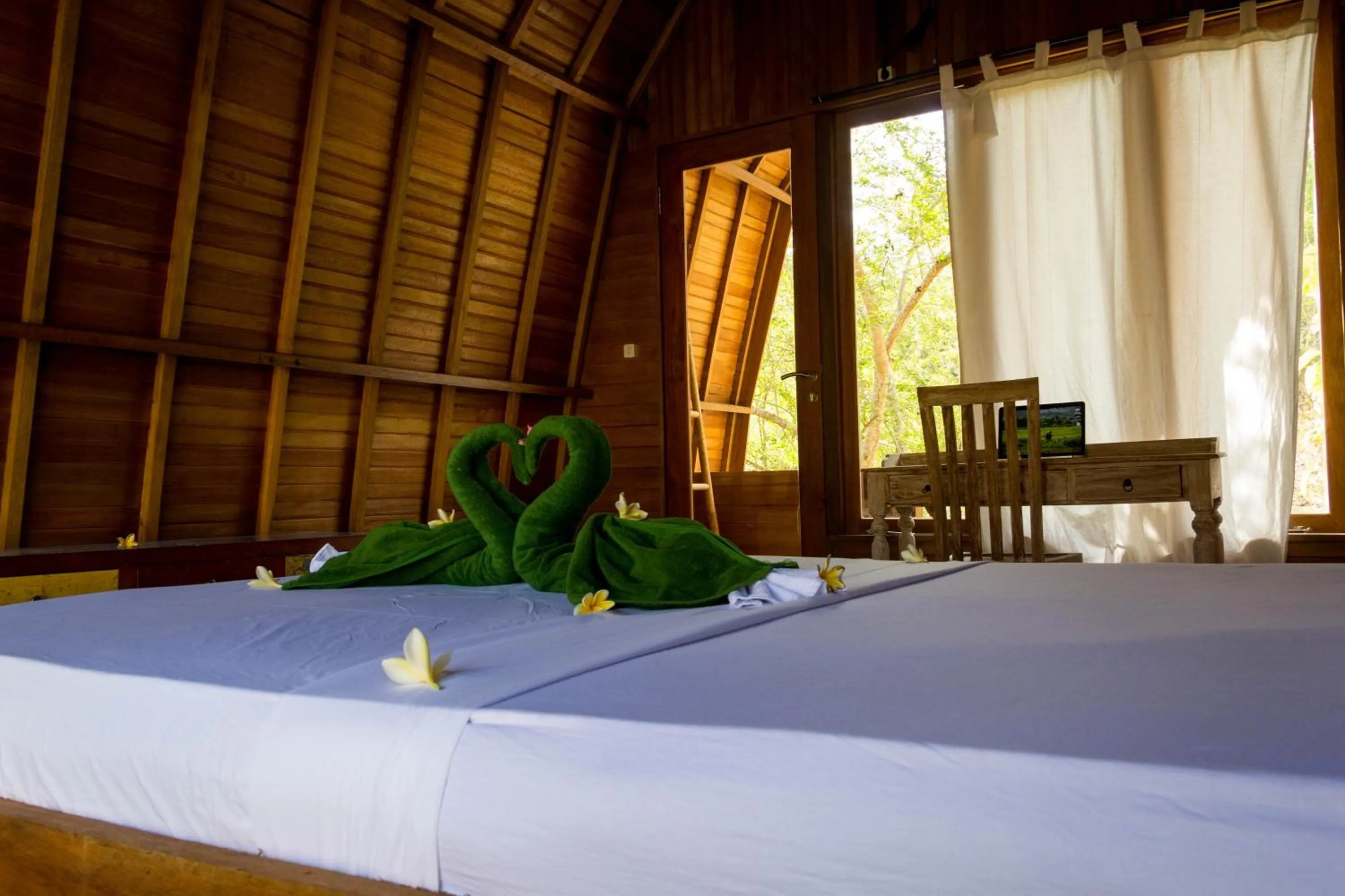 Bed in Majango Bungalows