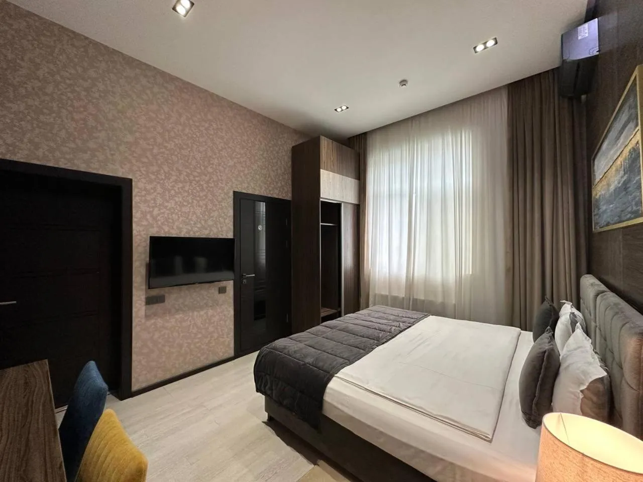 Bed in Home Boutique Hotel