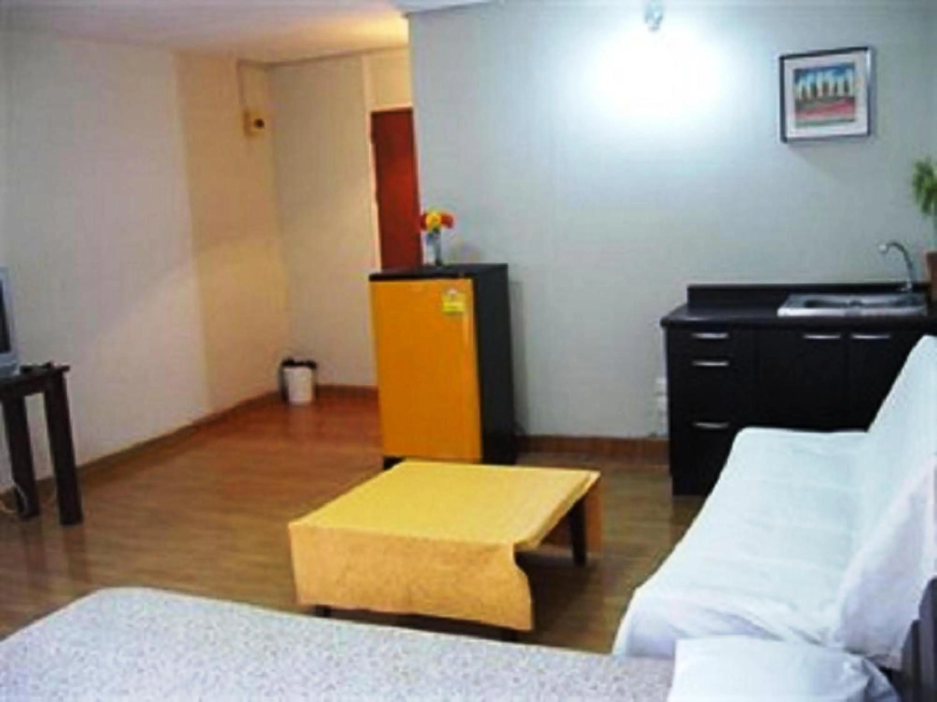 Bed in Poppular Palace Don Mueang Bangkok