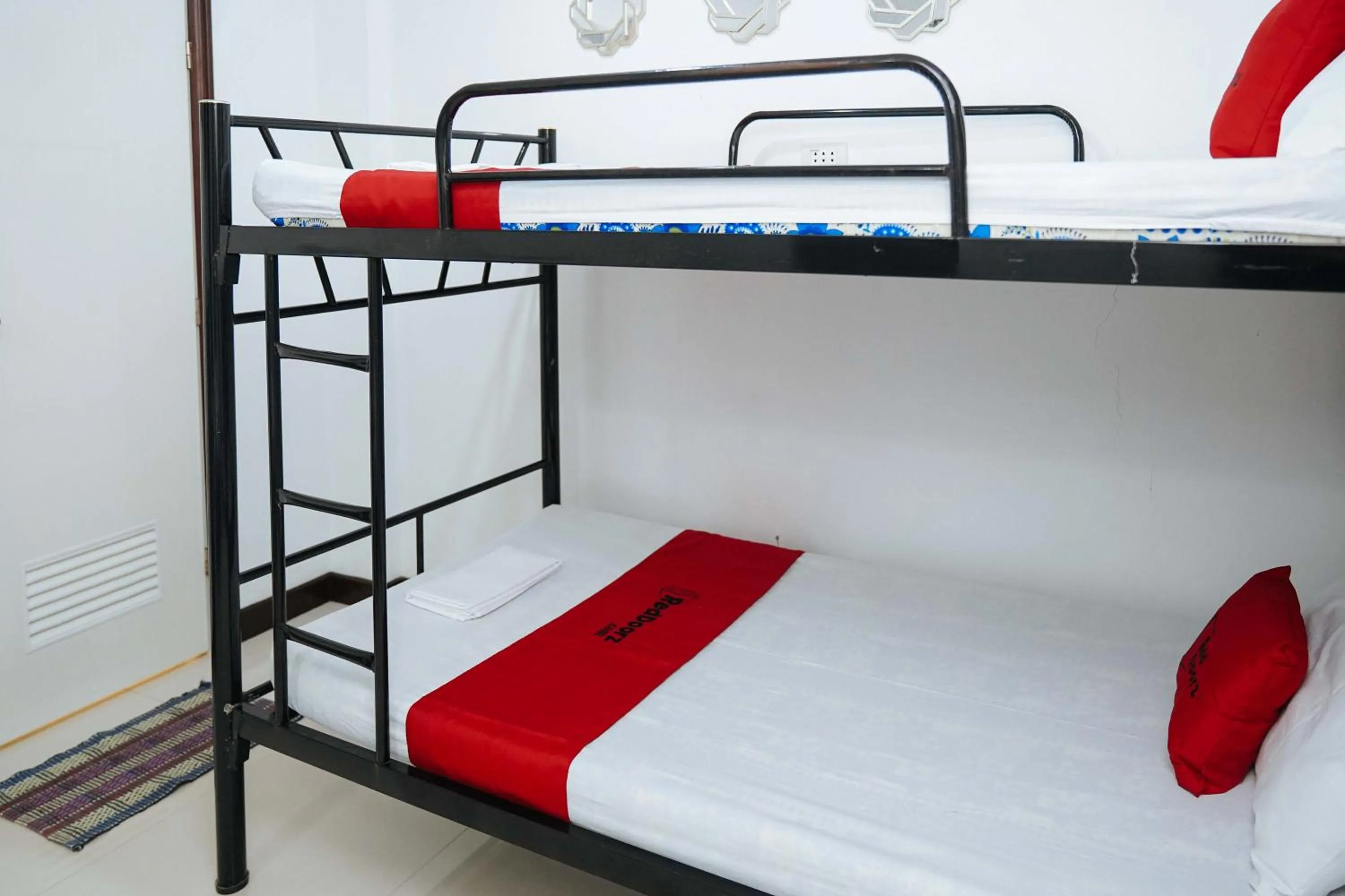 bunk bed, Bed in RedDoorz Plus at Billy's Resort Oslob