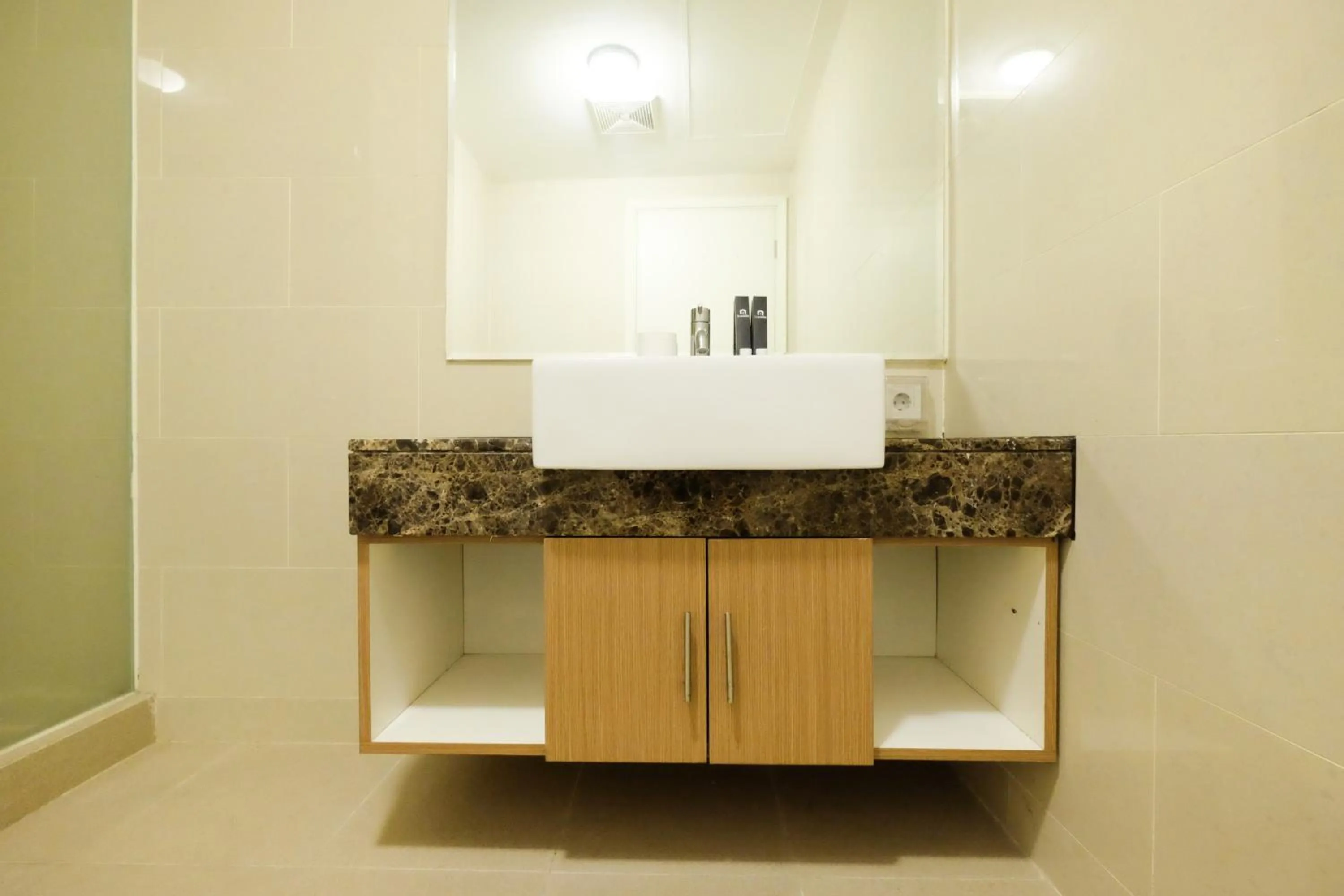 Homey 2BR Apartment at Casa Grande Residence By Travelio